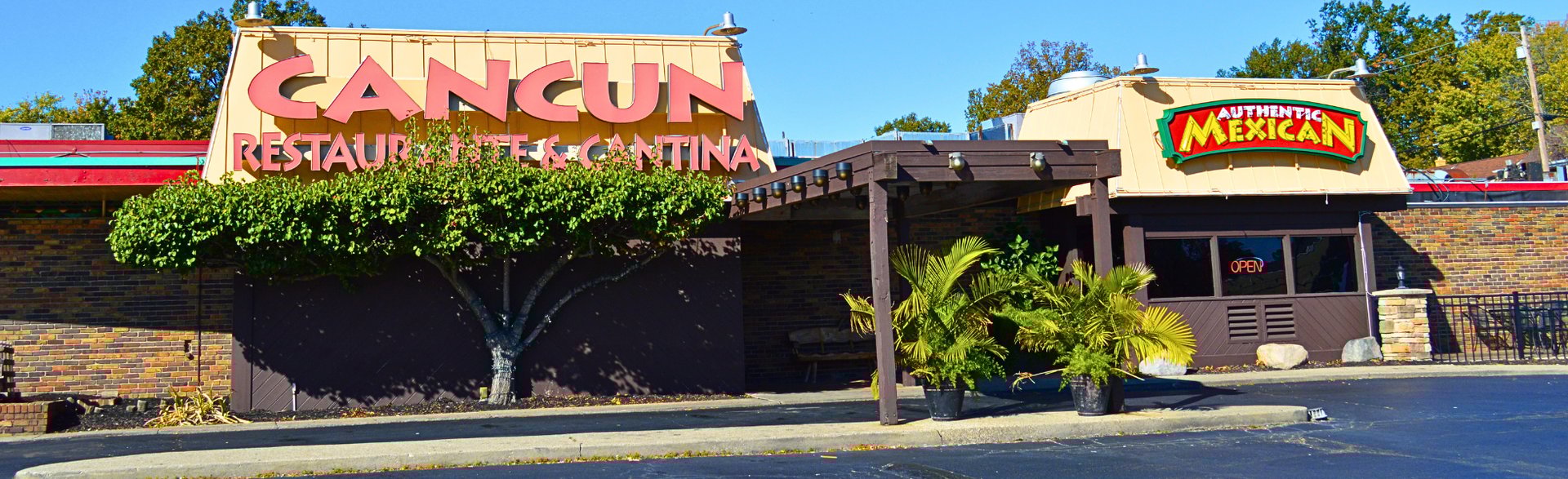 a table topped with lots of plates of food