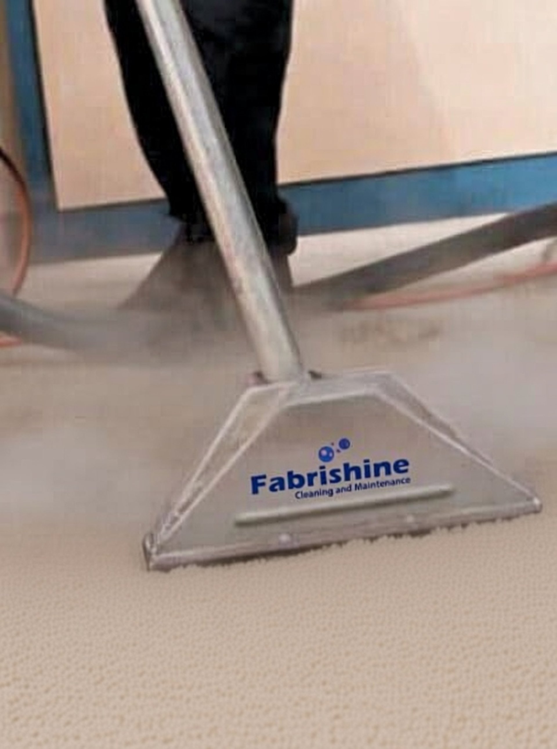 an abstract photo of a curved building with a blue sky in the background