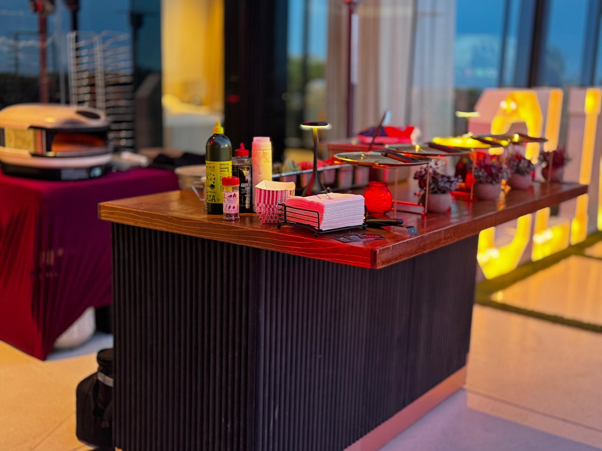 person holding black smartphone taking photo of pizza