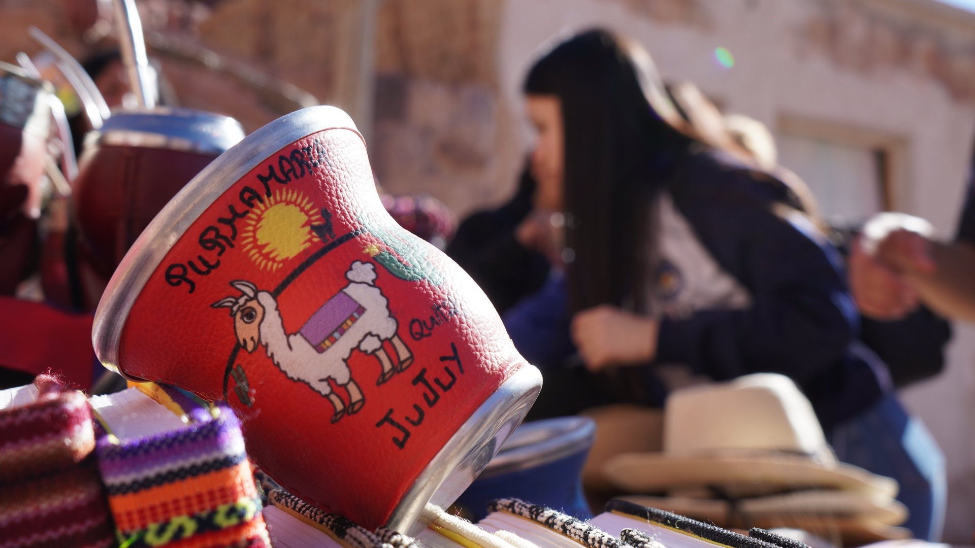woman wearing yellow long-sleeved dress under white clouds and blue sky during daytime