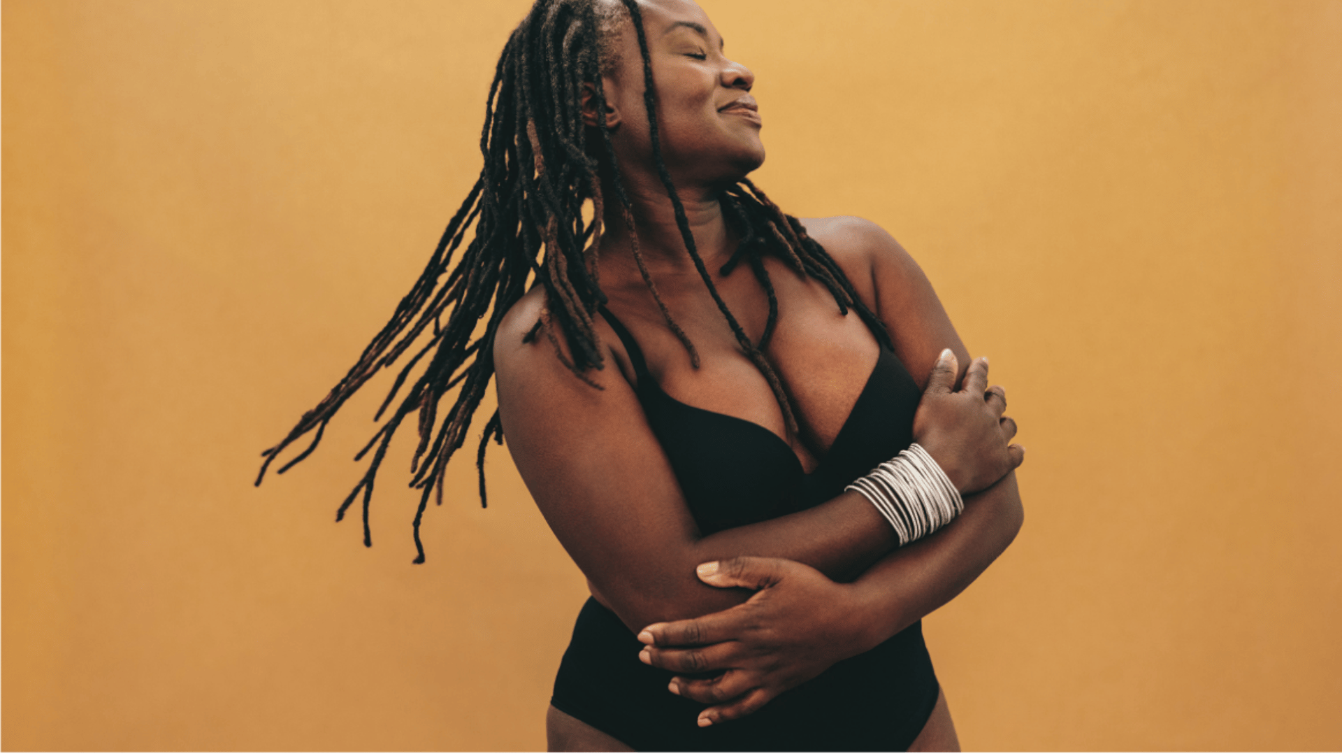 person lying down on white surface