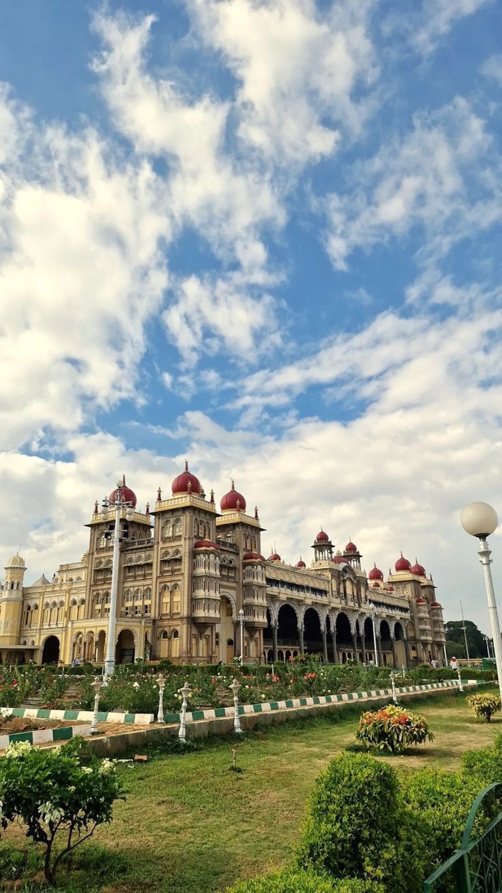 an abstract photo of a curved building with a blue sky in the background