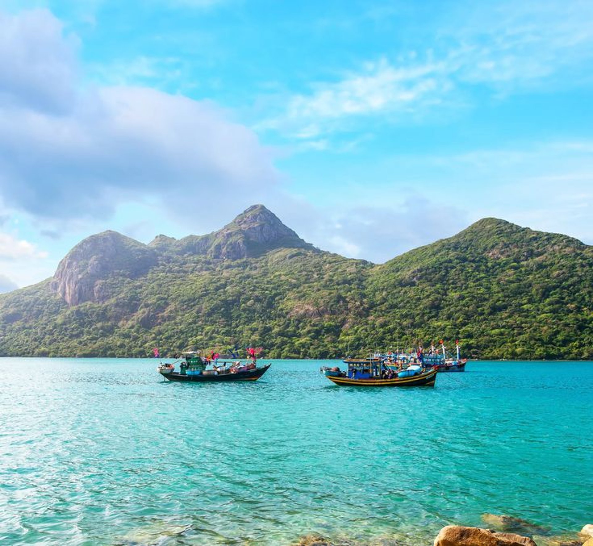 an abstract photo of a curved building with a blue sky in the background