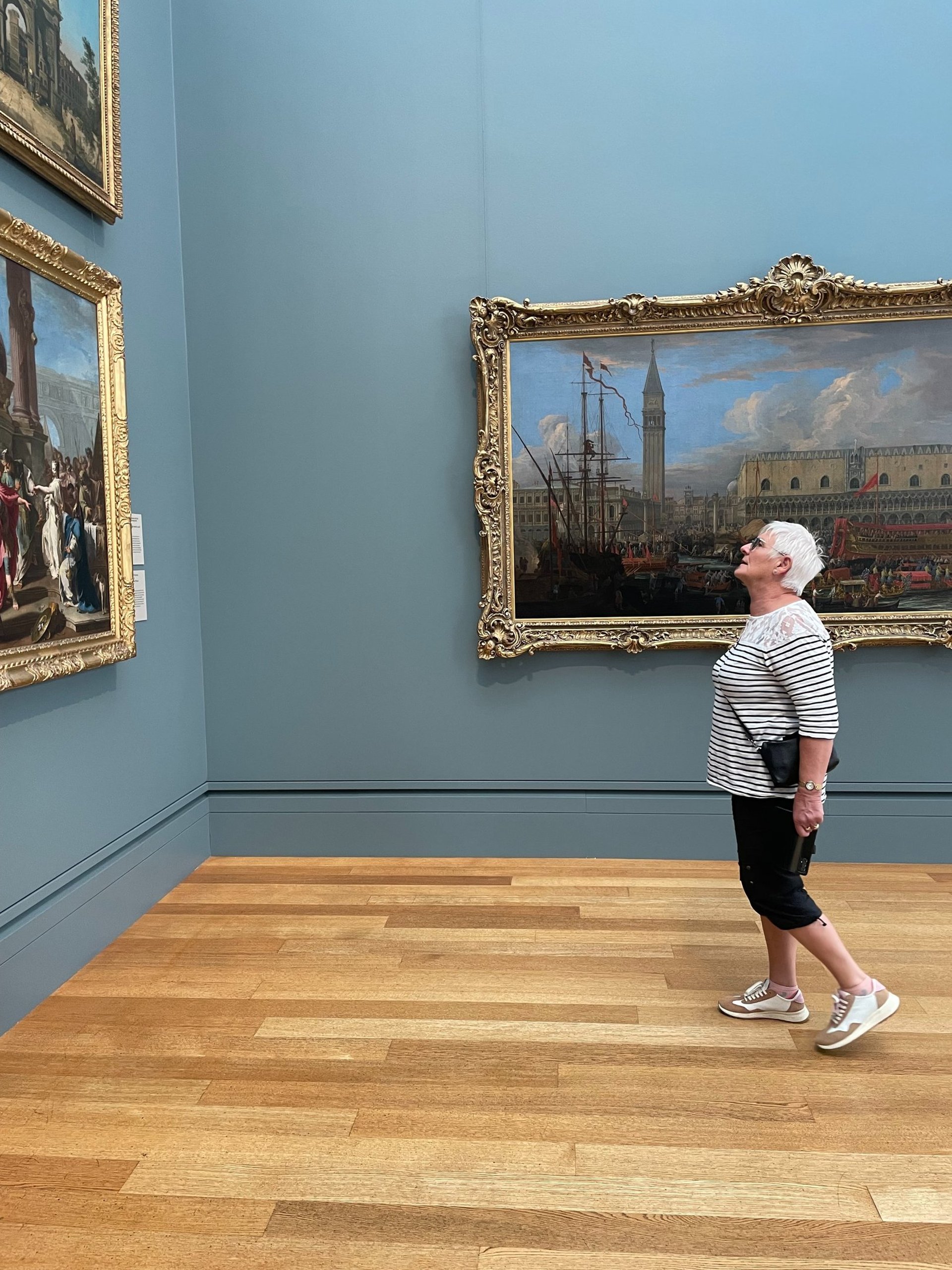 a close up of a black and brown abstract painting