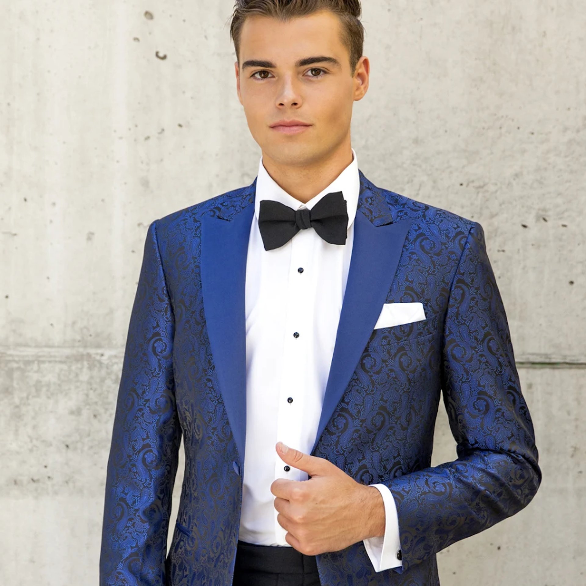 an abstract photo of a curved building with a blue sky in the background