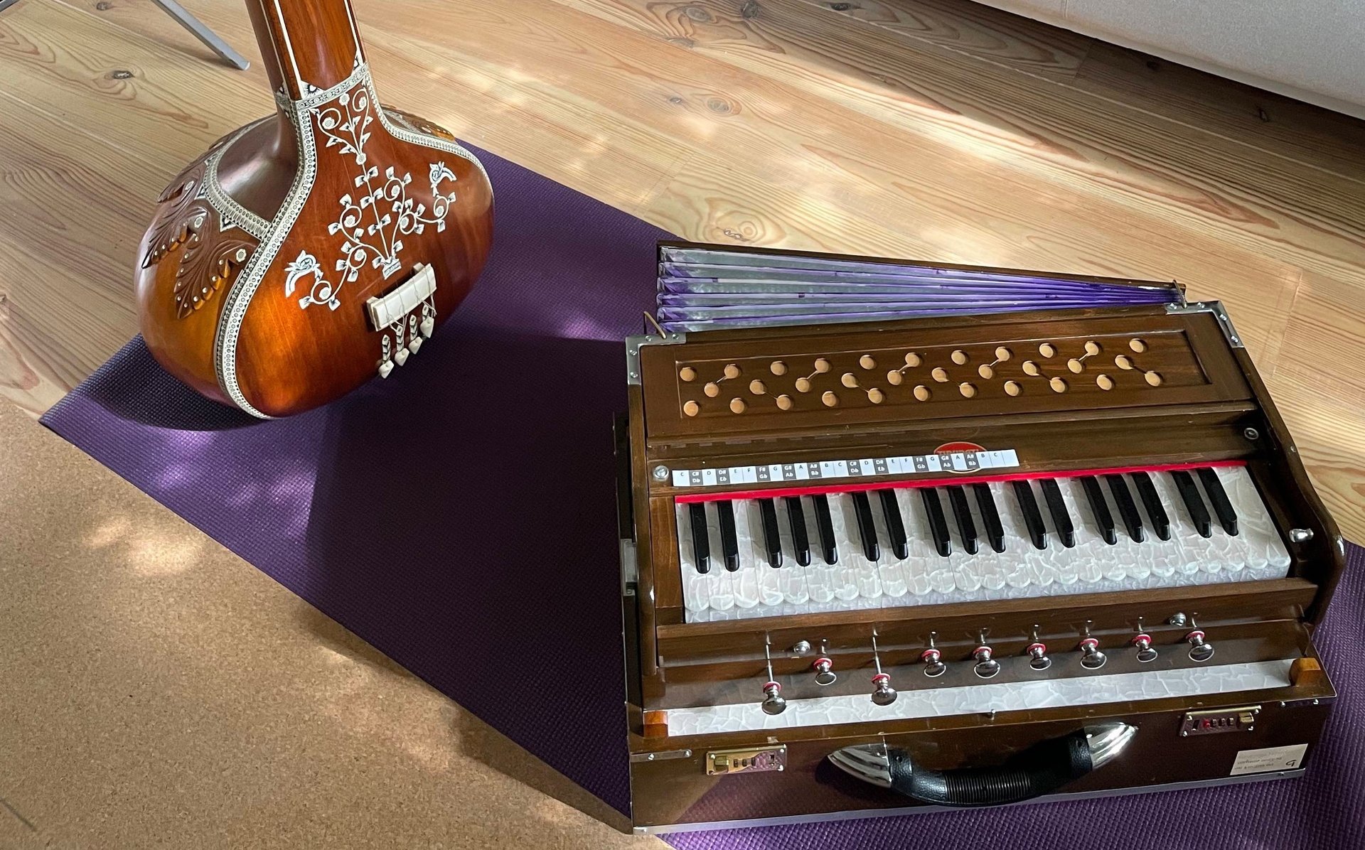 an abstract photo of a curved building with a blue sky in the background