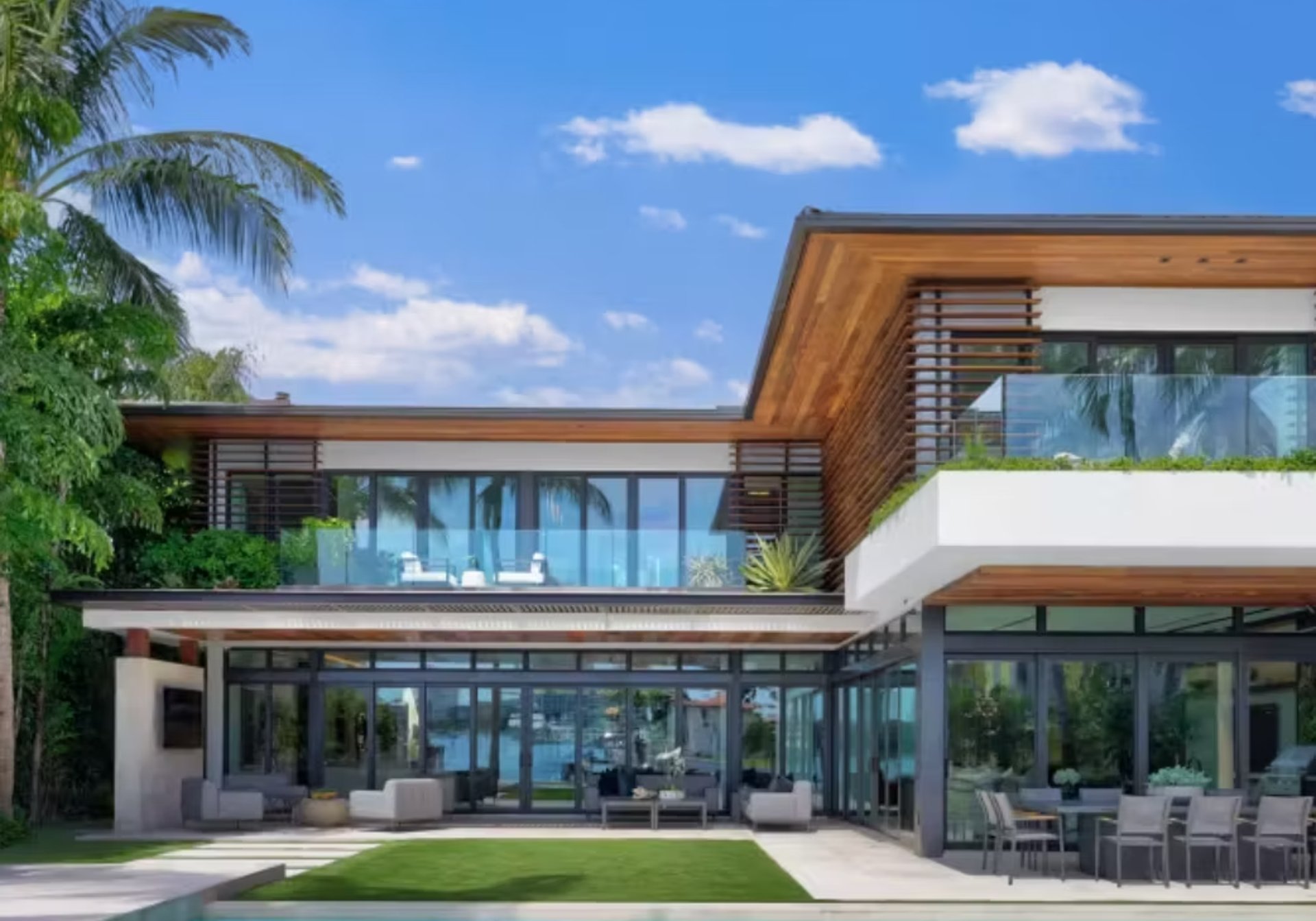 black and brown leather padded tub sofa