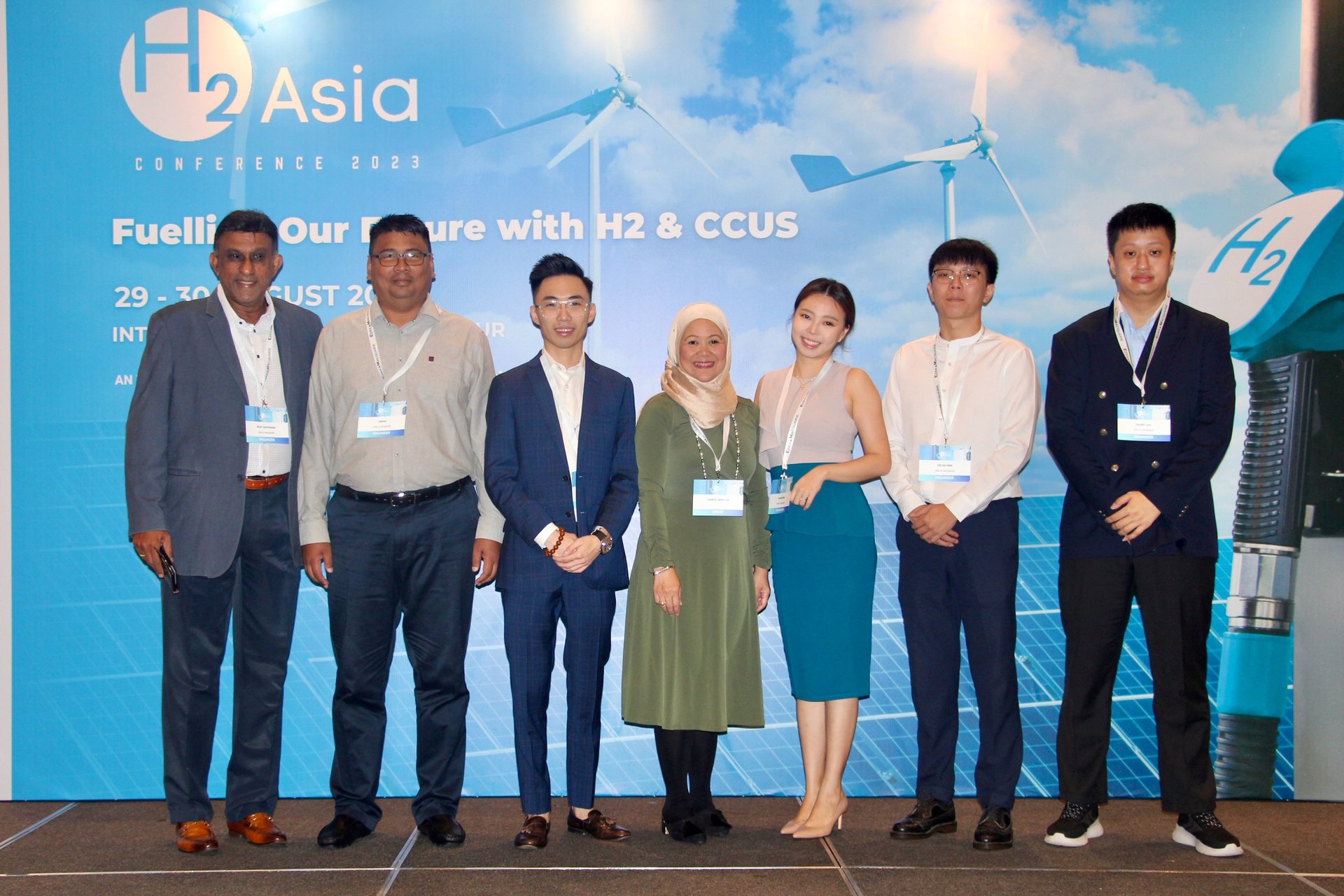 an abstract photo of a curved building with a blue sky in the background