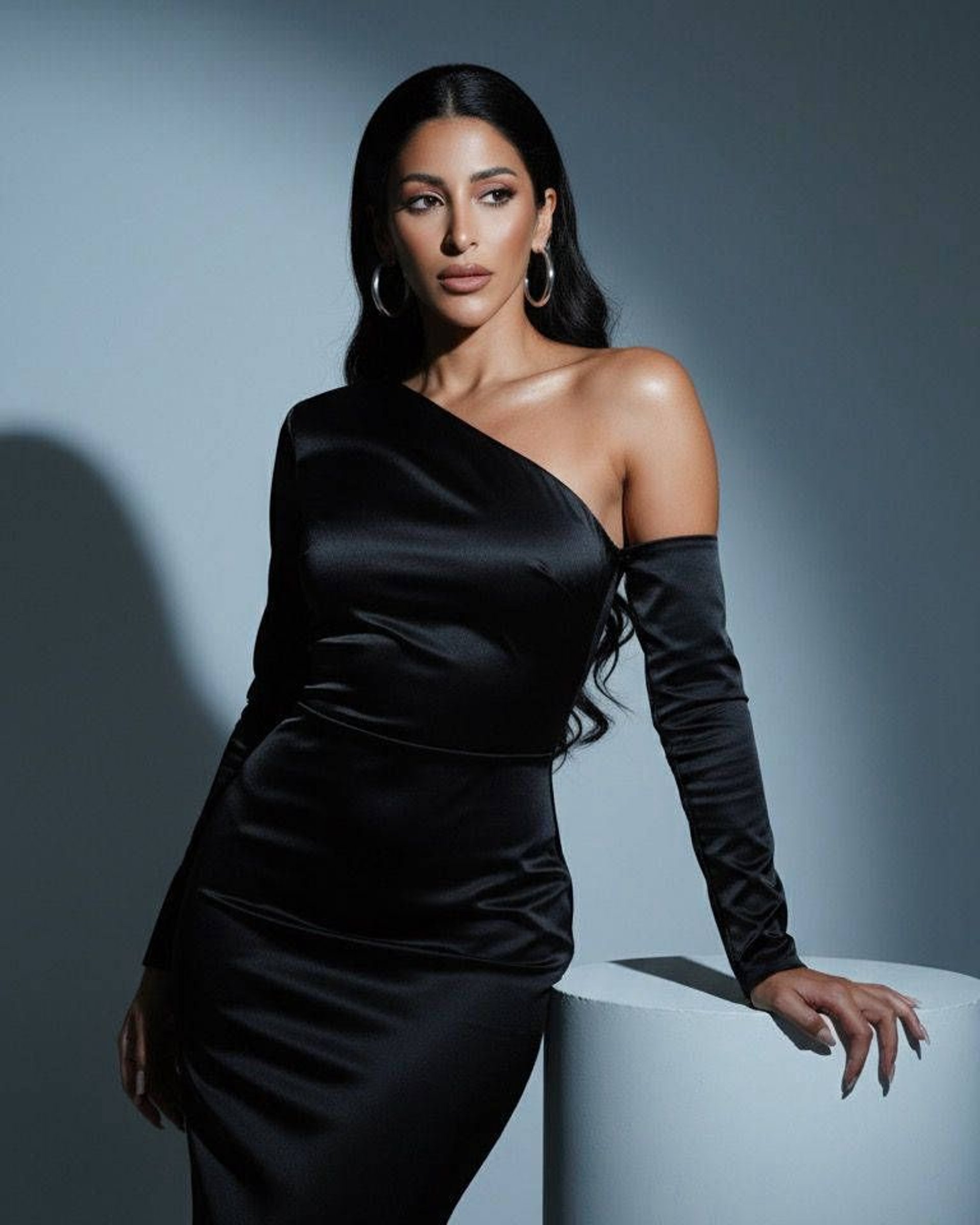 black and brown leather padded tub sofa