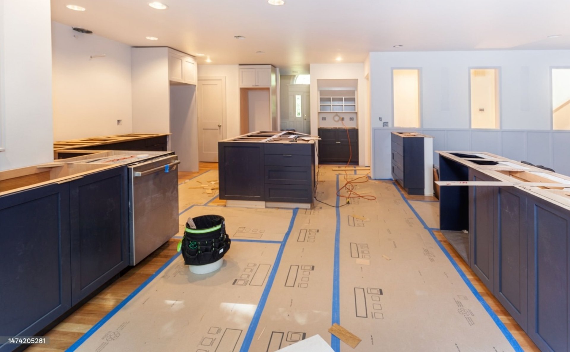 man wearing black jacket holding rod