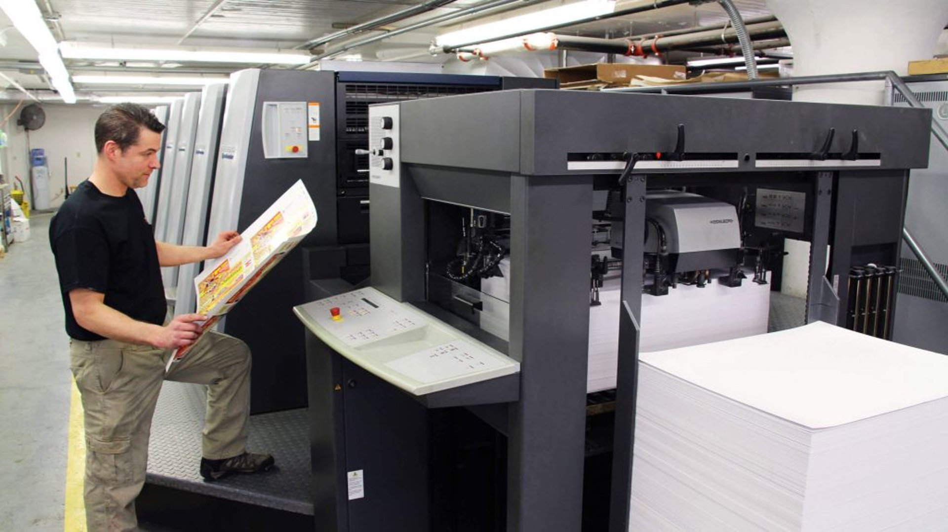 an abstract photo of a curved building with a blue sky in the background
