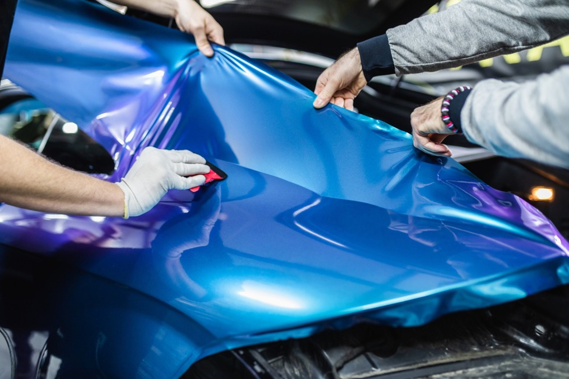an abstract photo of a curved building with a blue sky in the background