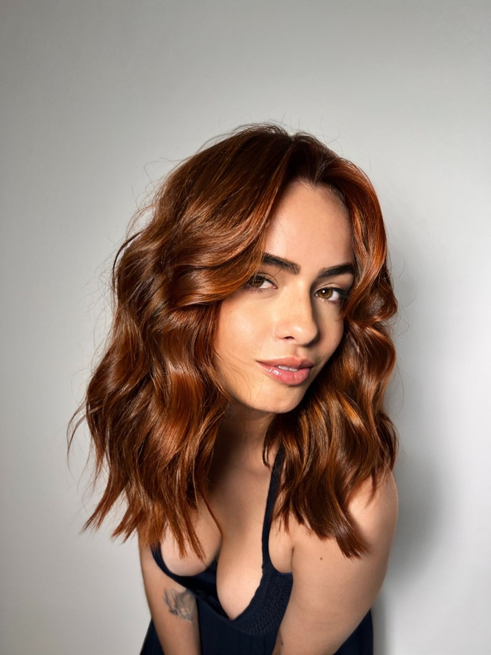 grayscale photo of woman on seashore