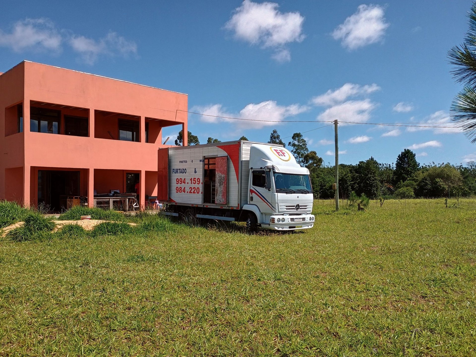 black and brown leather padded tub sofa