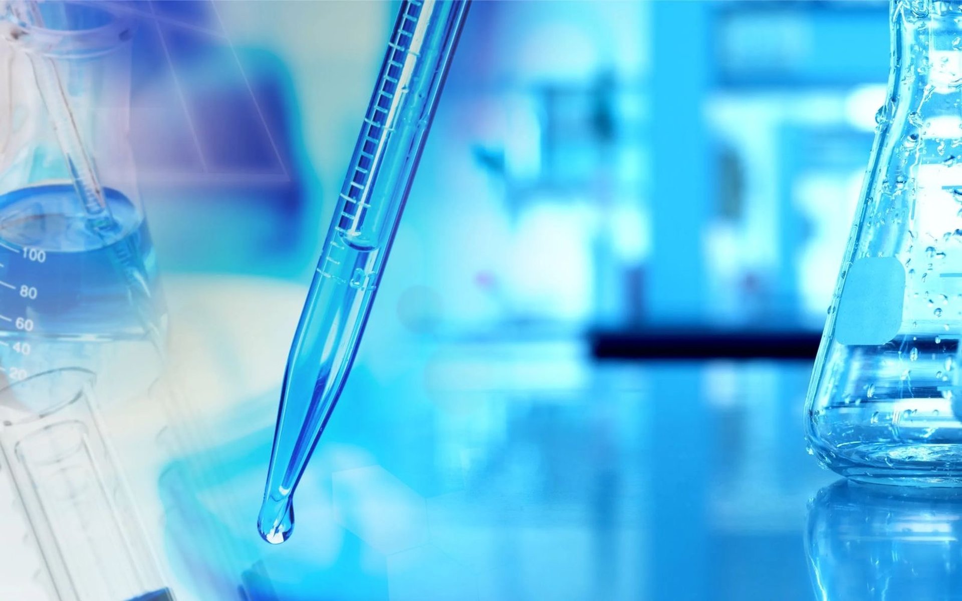 clear glass bottle on green textile