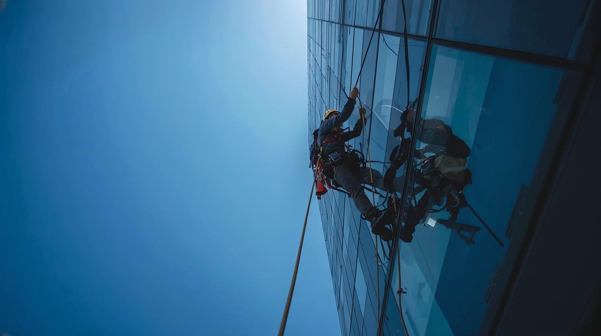 a close up of a black and brown abstract painting