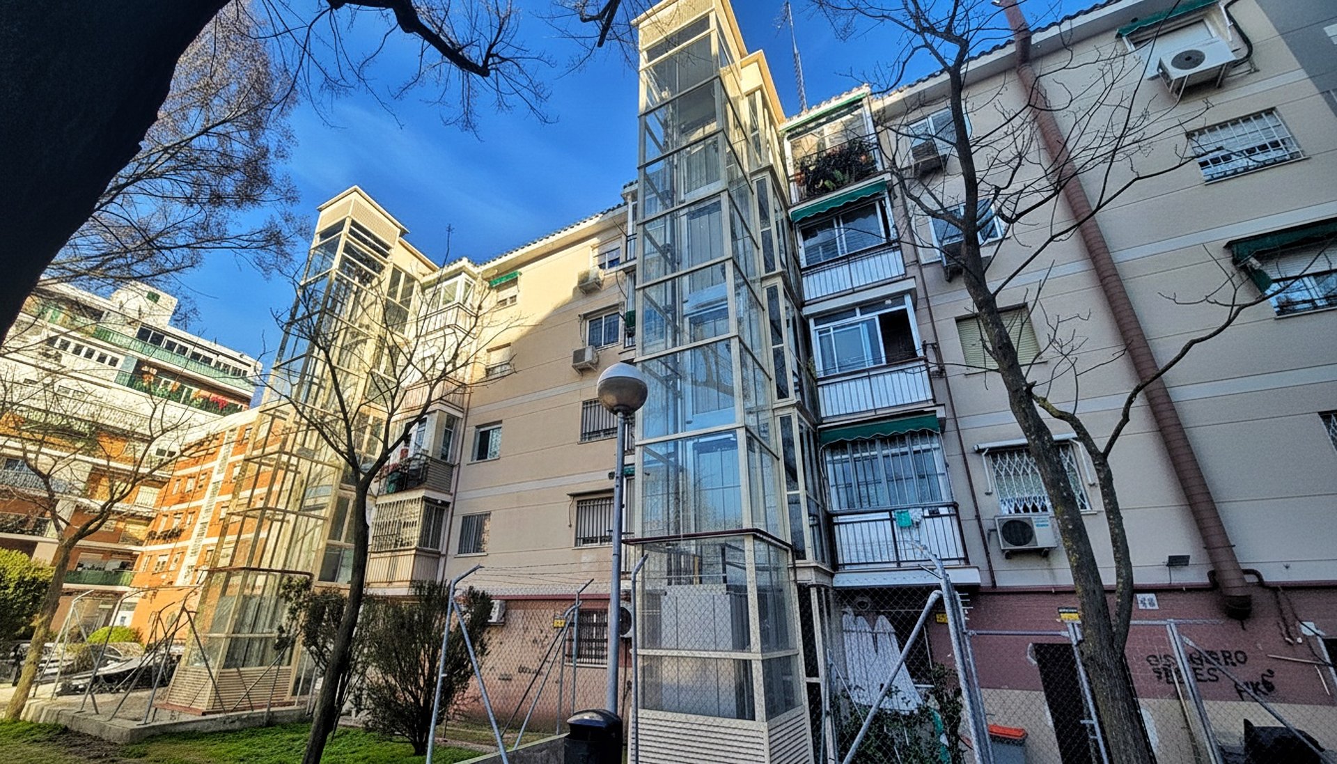 persons left foot on black and white vending machine