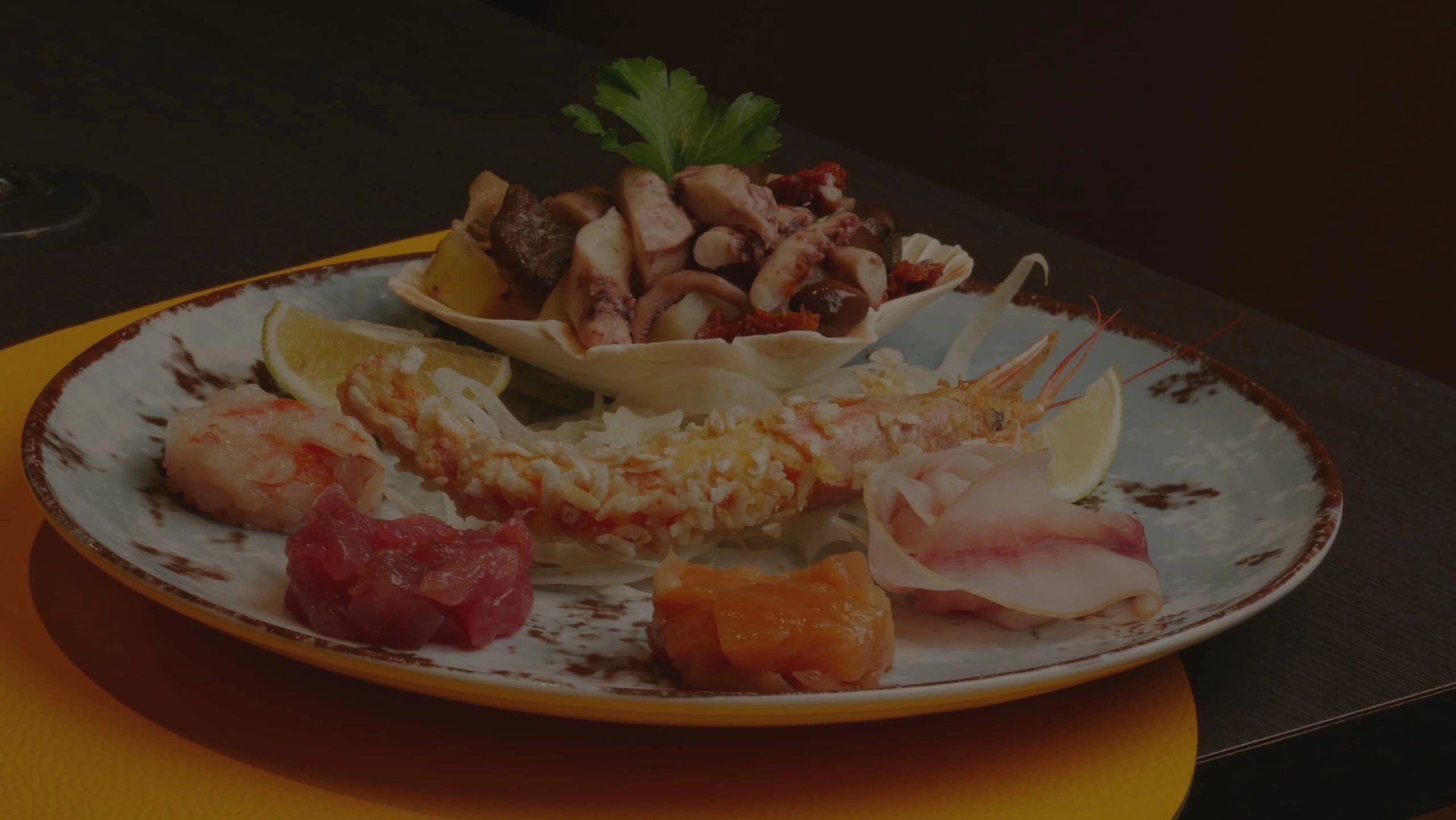 an abstract photo of a curved building with a blue sky in the background