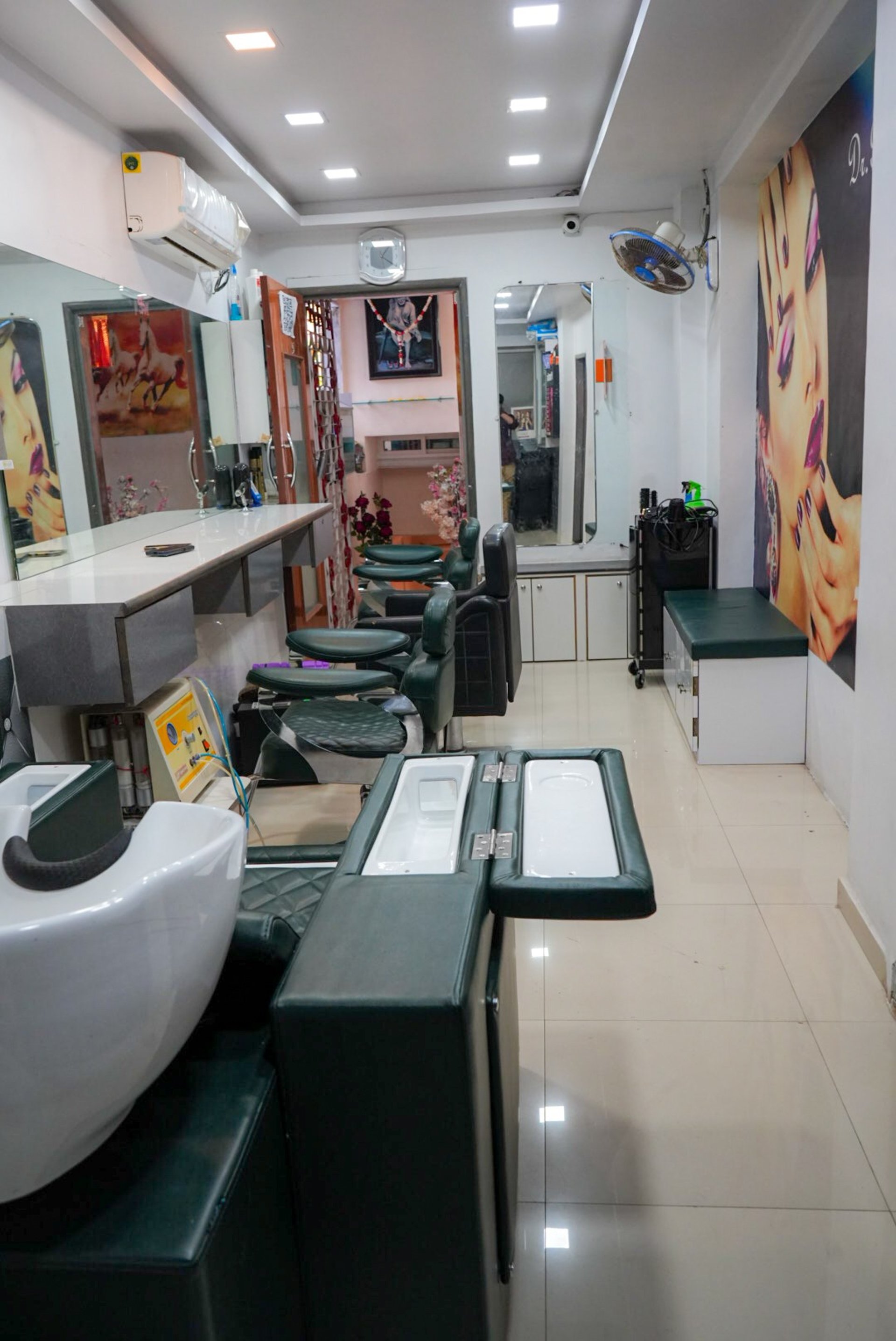 a room filled with furniture and a large window