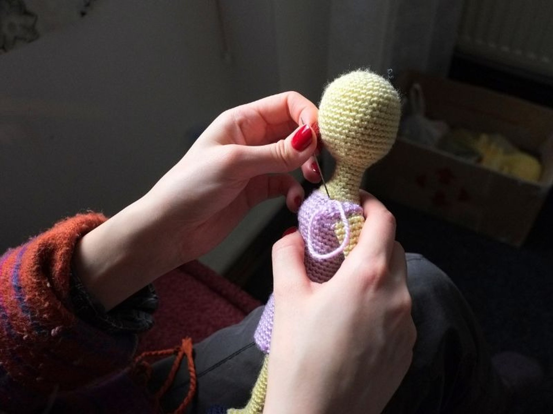 an abstract photo of a curved building with a blue sky in the background