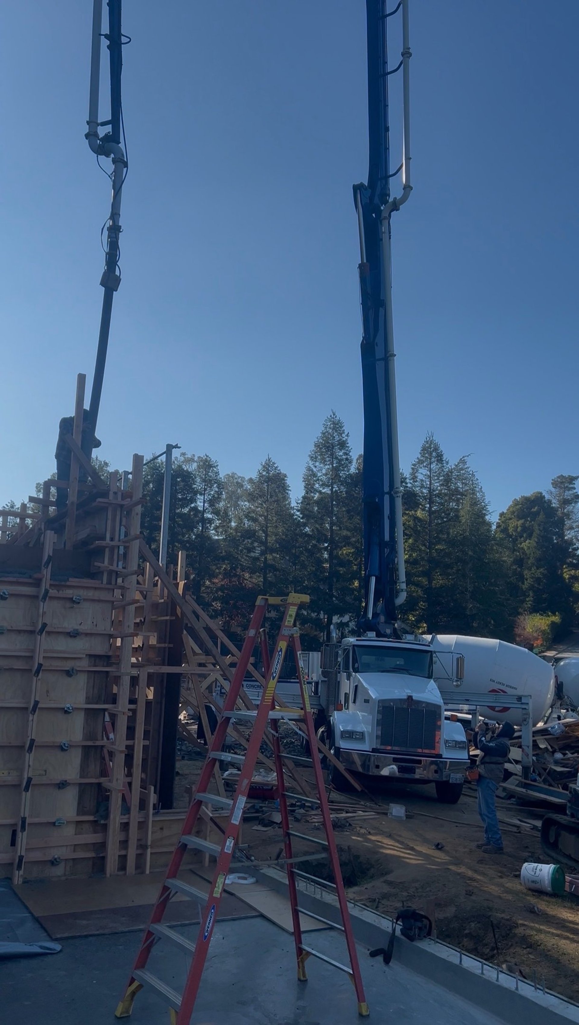 woman wearing yellow long-sleeved dress under white clouds and blue sky during daytime