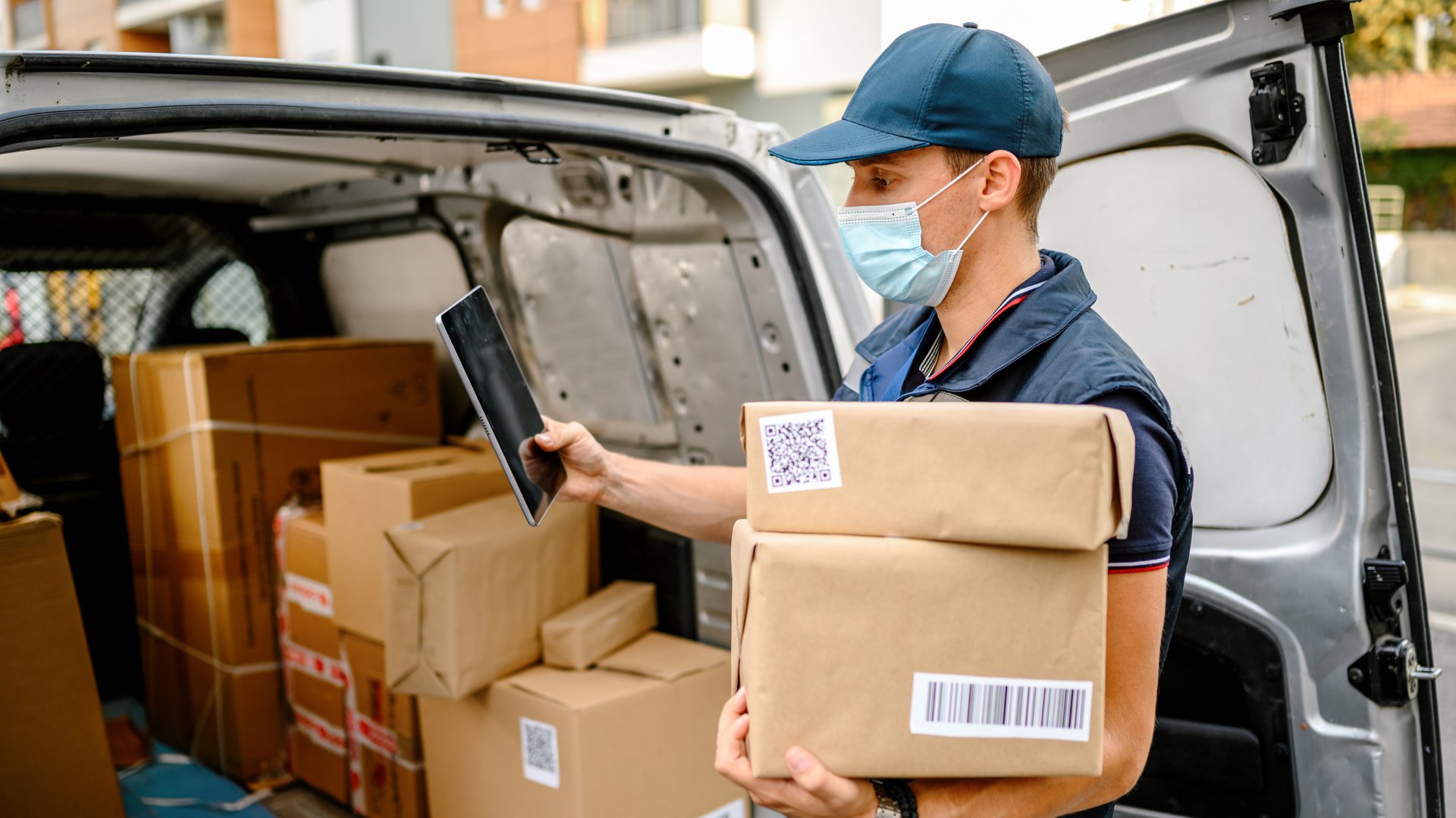 black and brown leather padded tub sofa