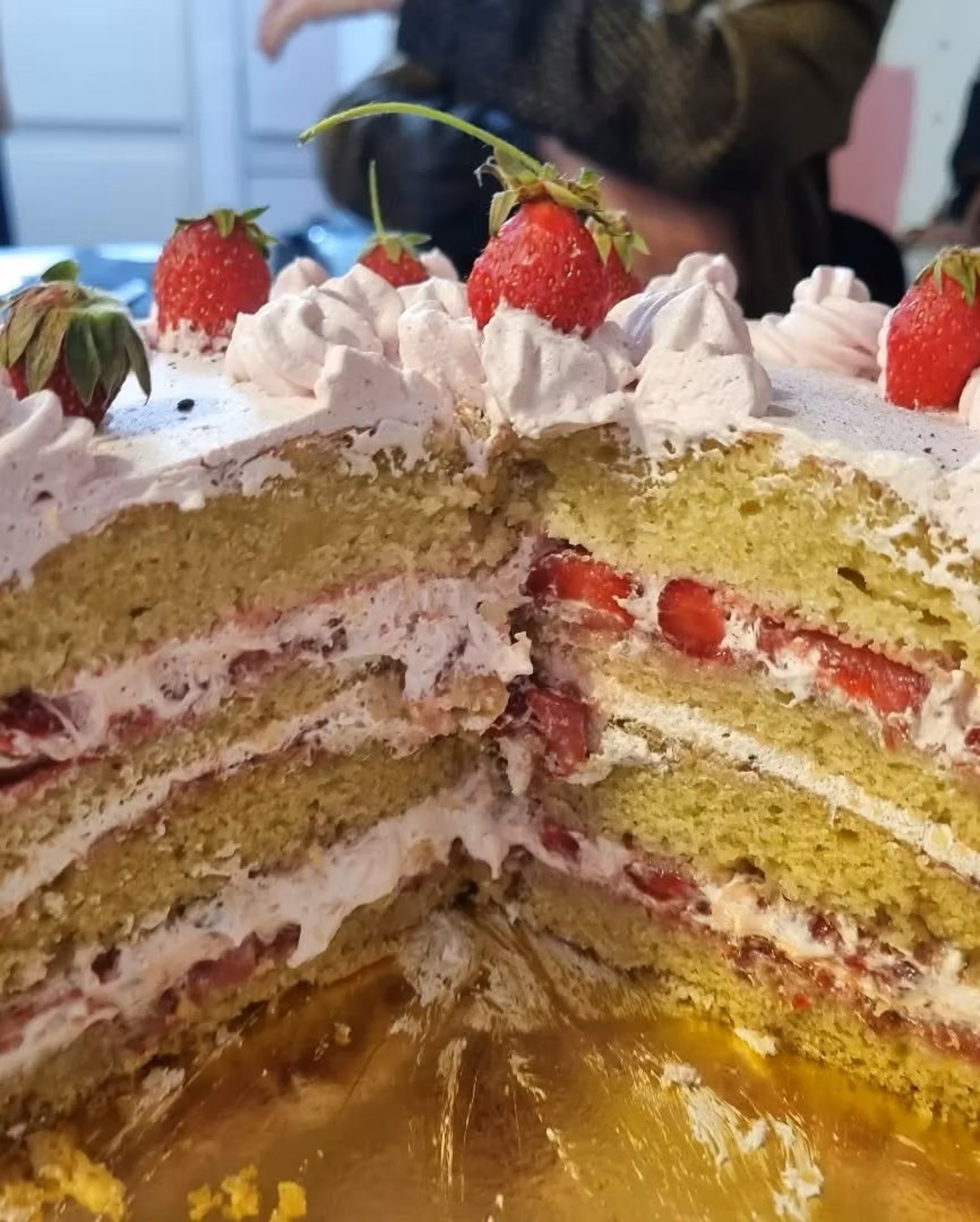 an abstract photo of a curved building with a blue sky in the background