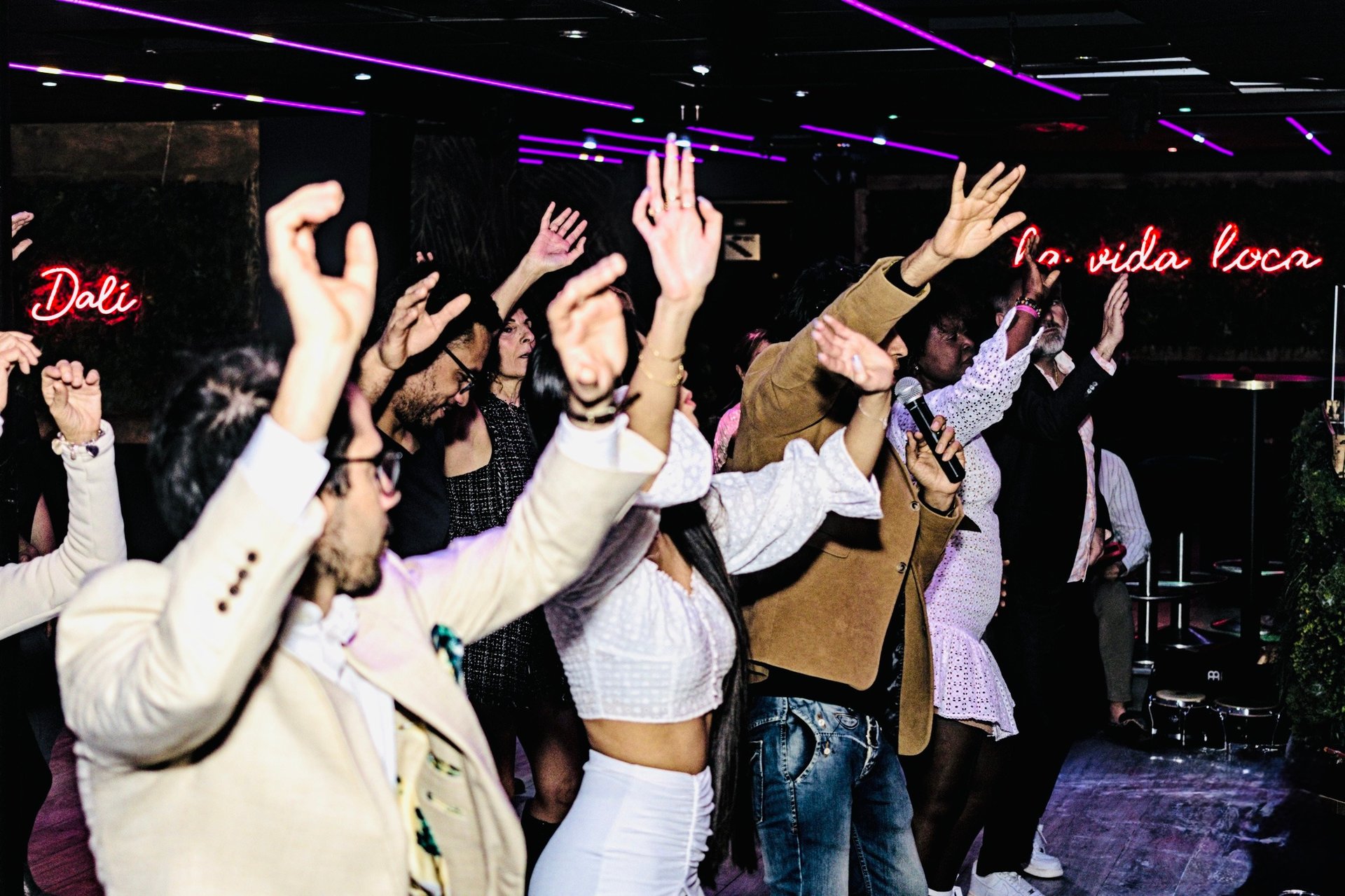 woman wearing yellow long-sleeved dress under white clouds and blue sky during daytime