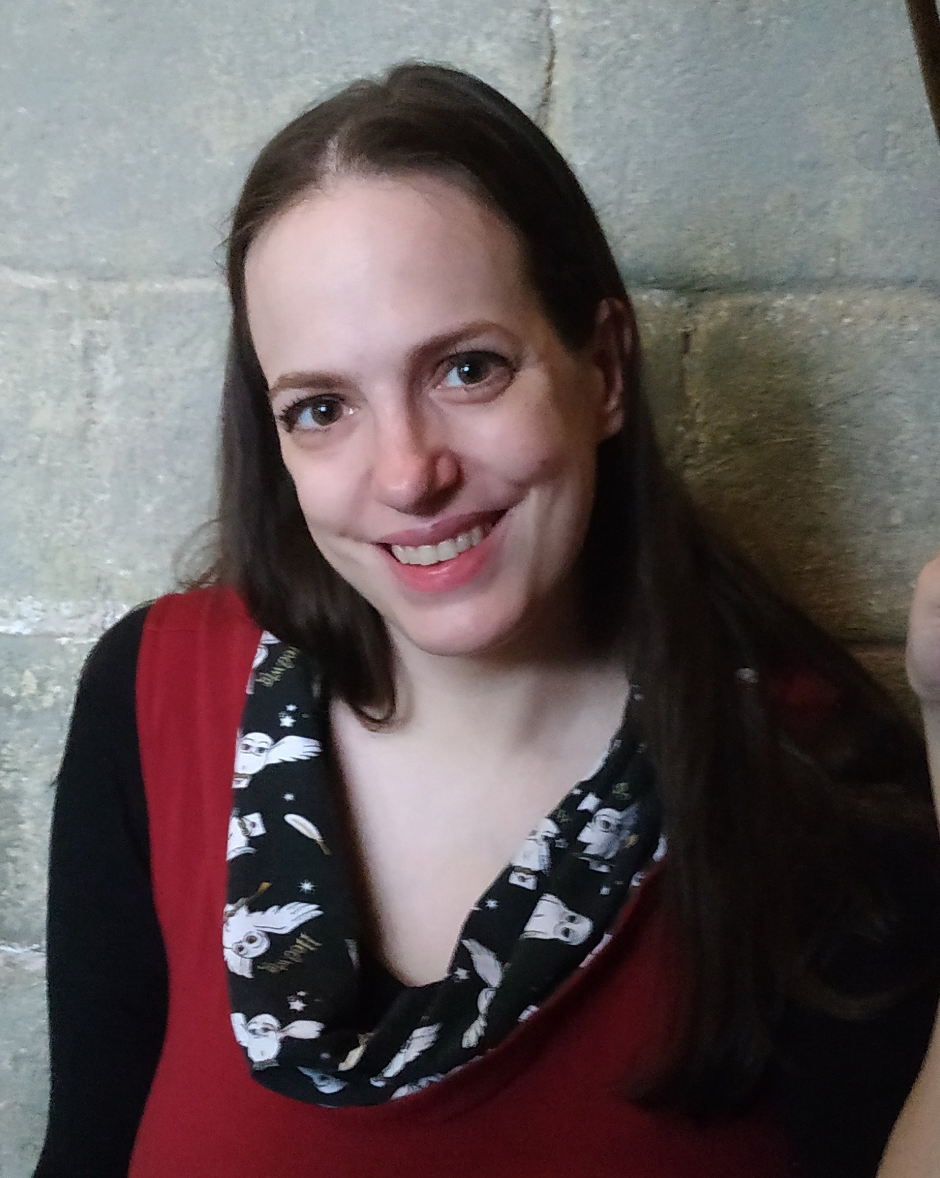 person wearing grey knit sweater