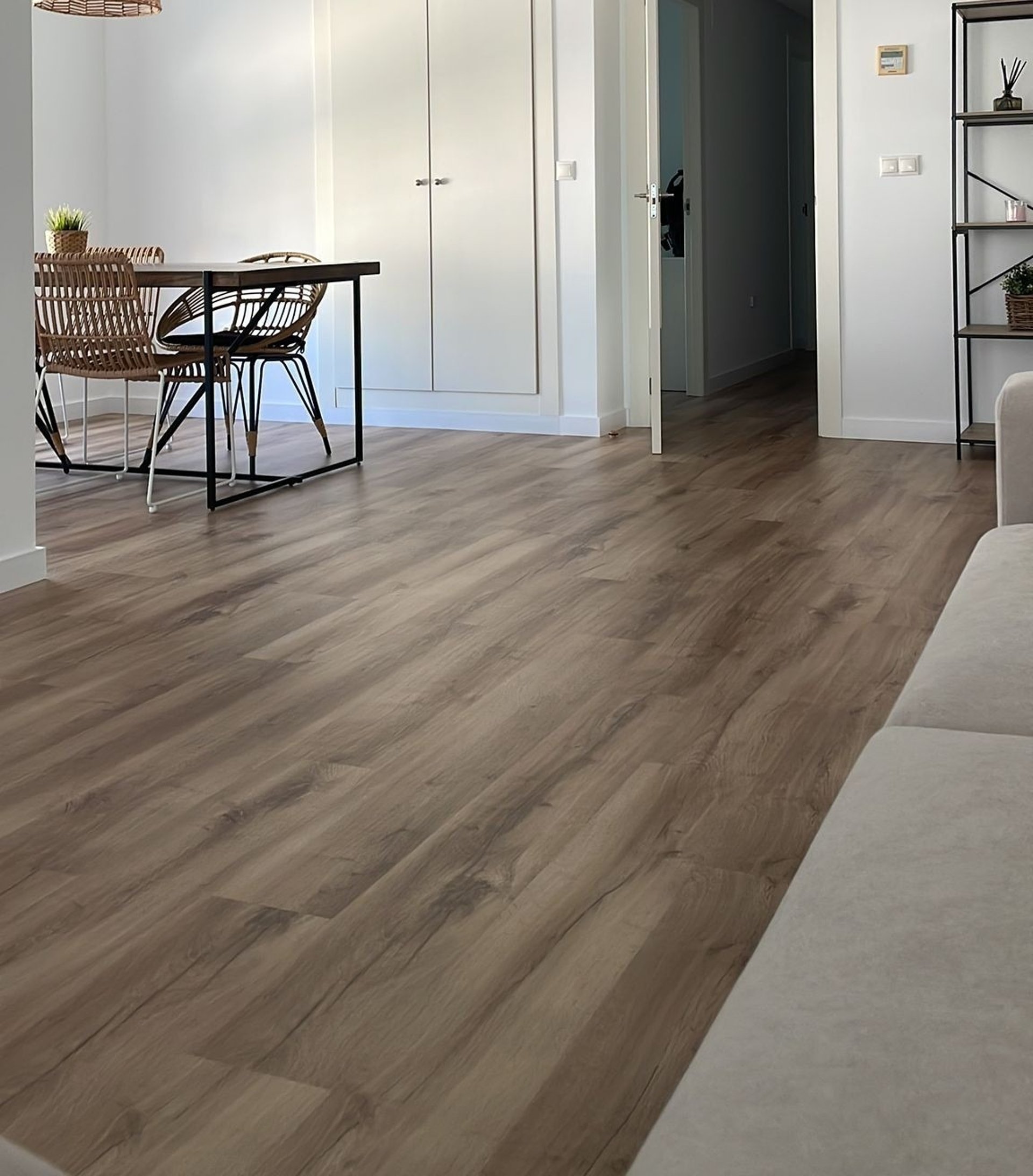 two brown wooden wall decors