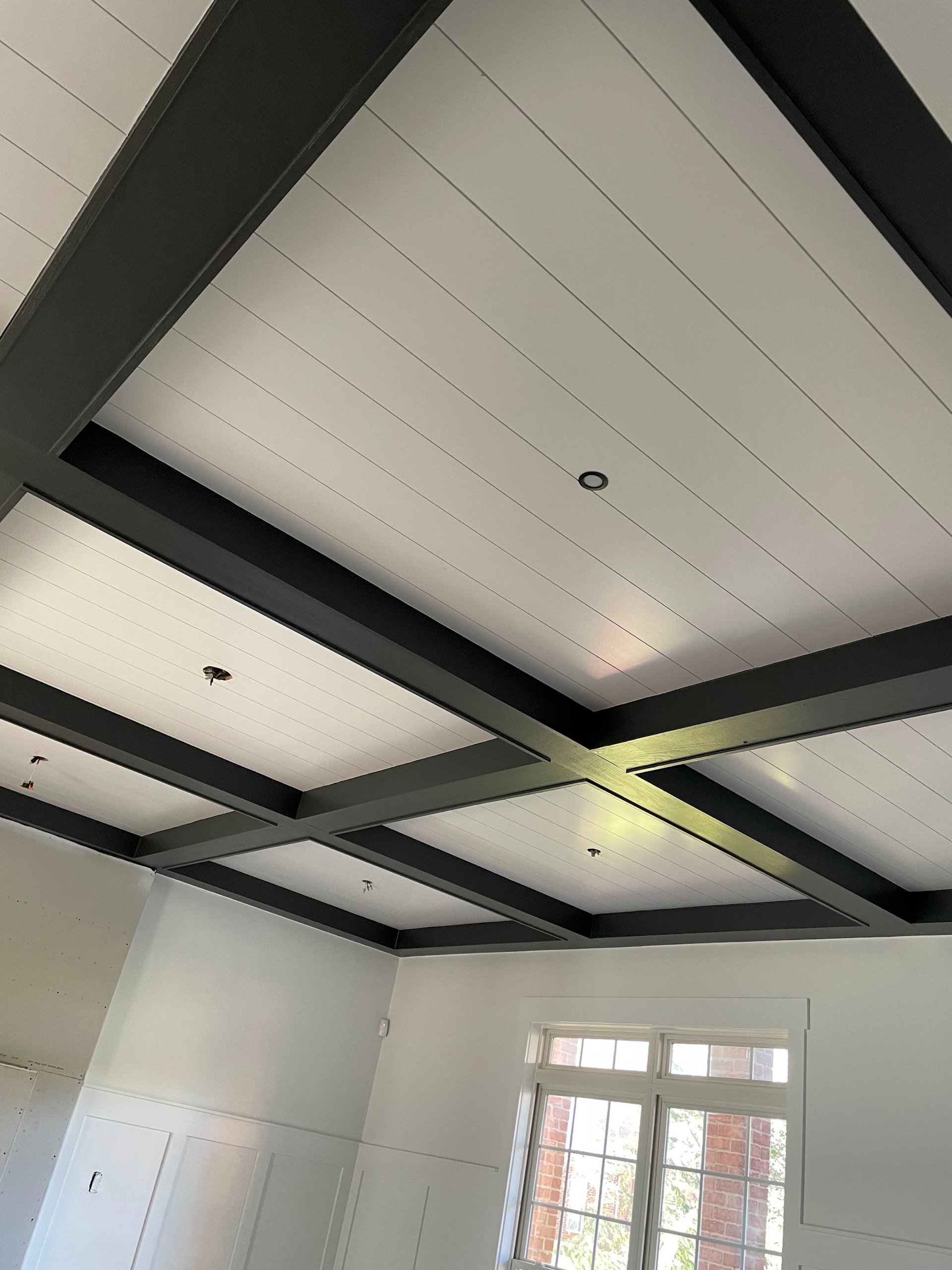 black and brown leather padded tub sofa