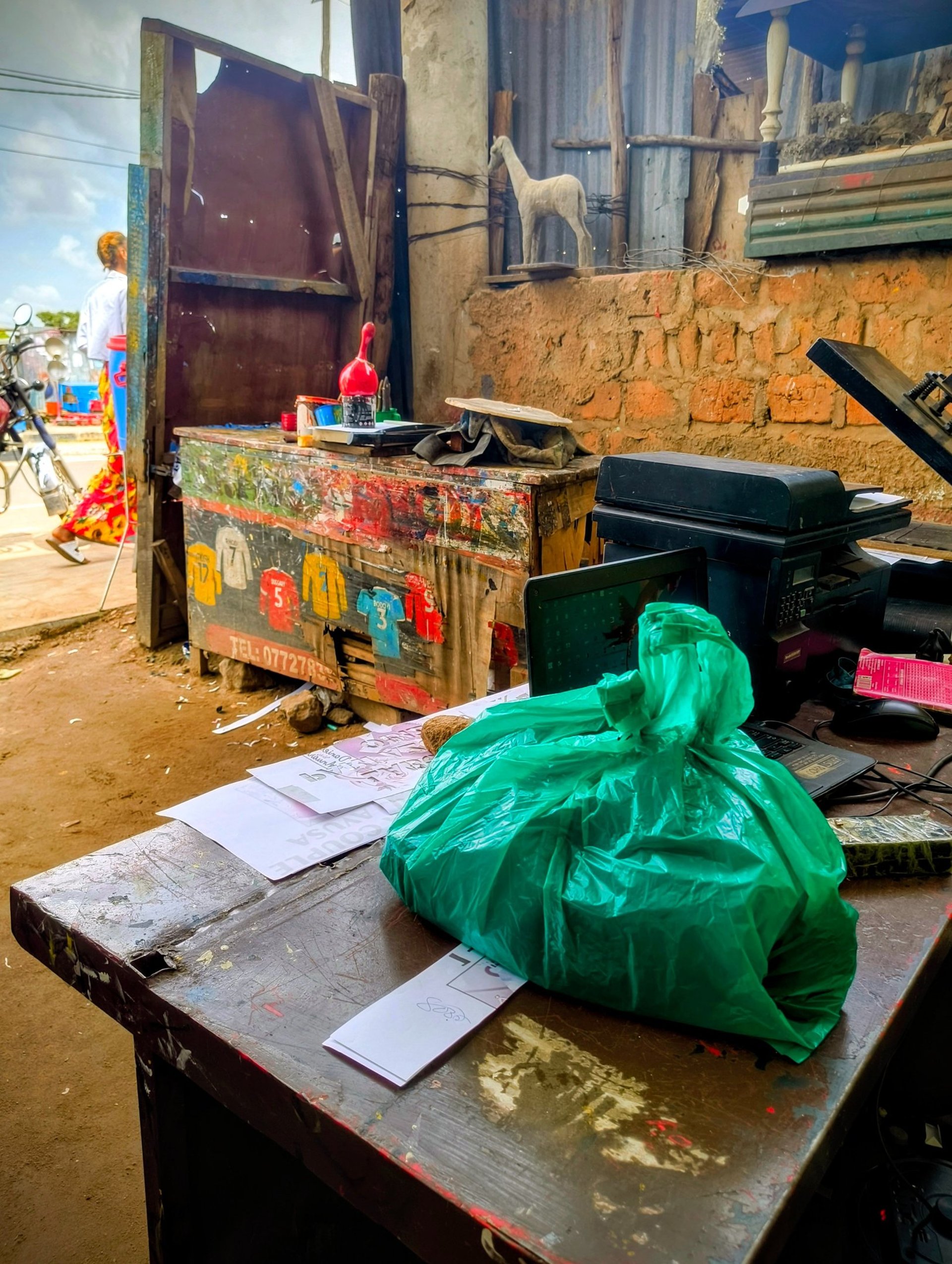 an abstract photo of a curved building with a blue sky in the background