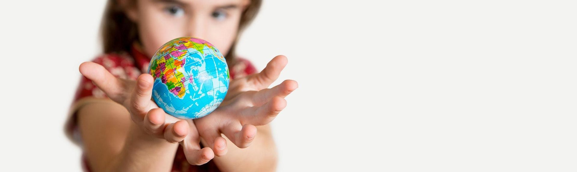 an abstract photo of a curved building with a blue sky in the background