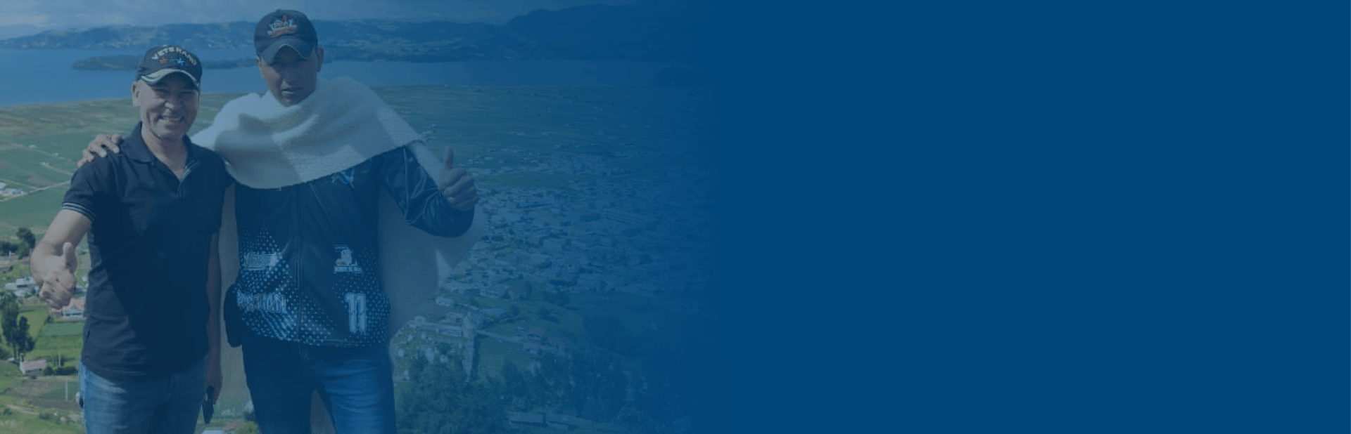 a man riding skis down a snow covered slope