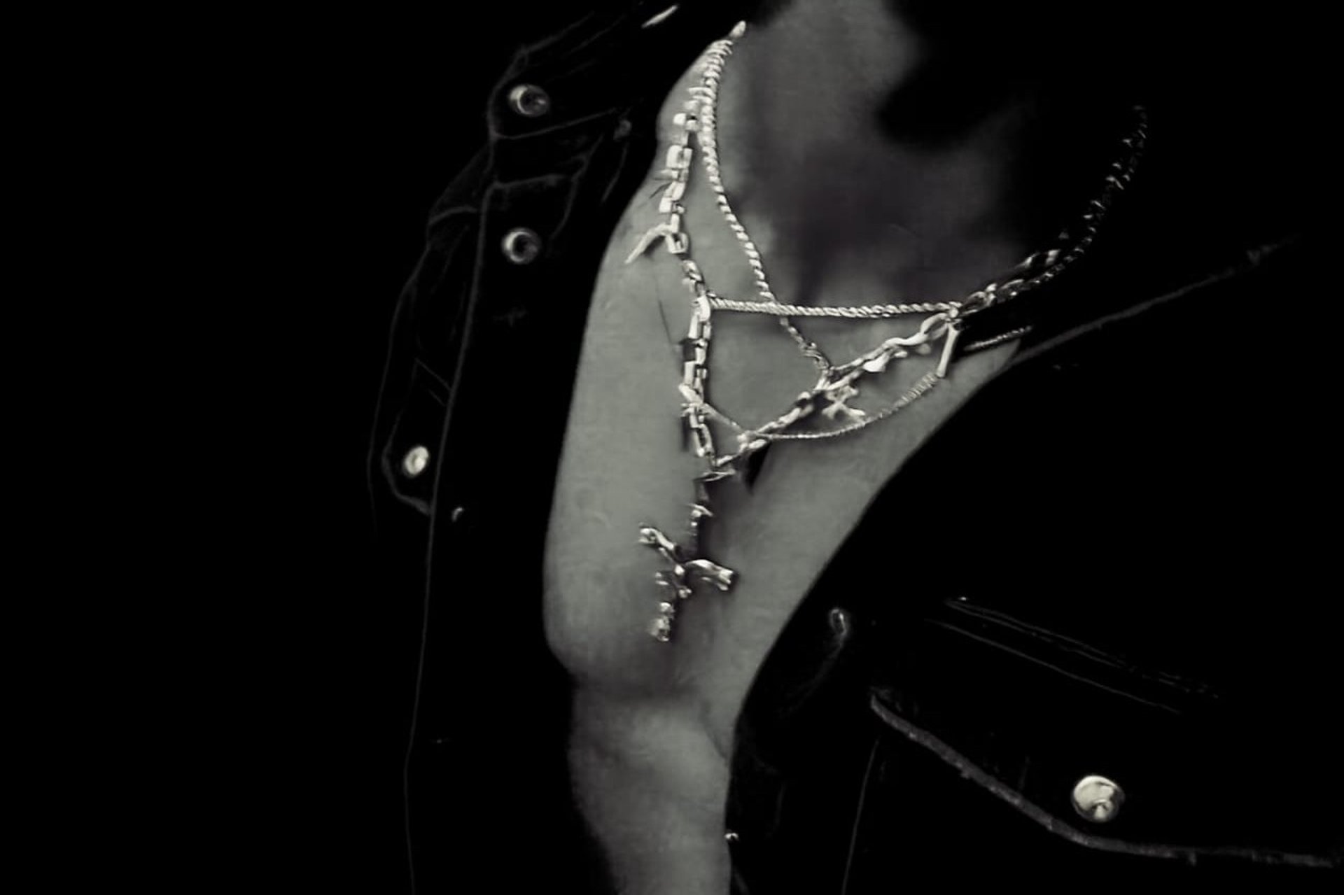 an abstract photo of a curved building with a blue sky in the background