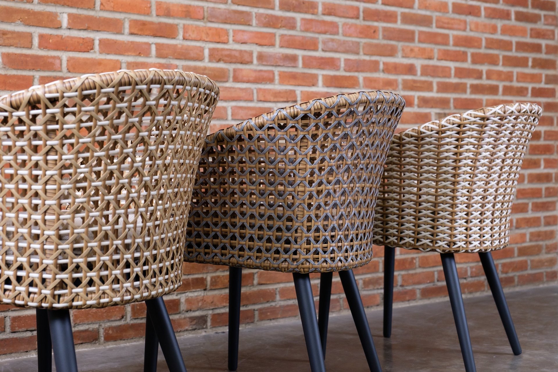 an abstract photo of a curved building with a blue sky in the background