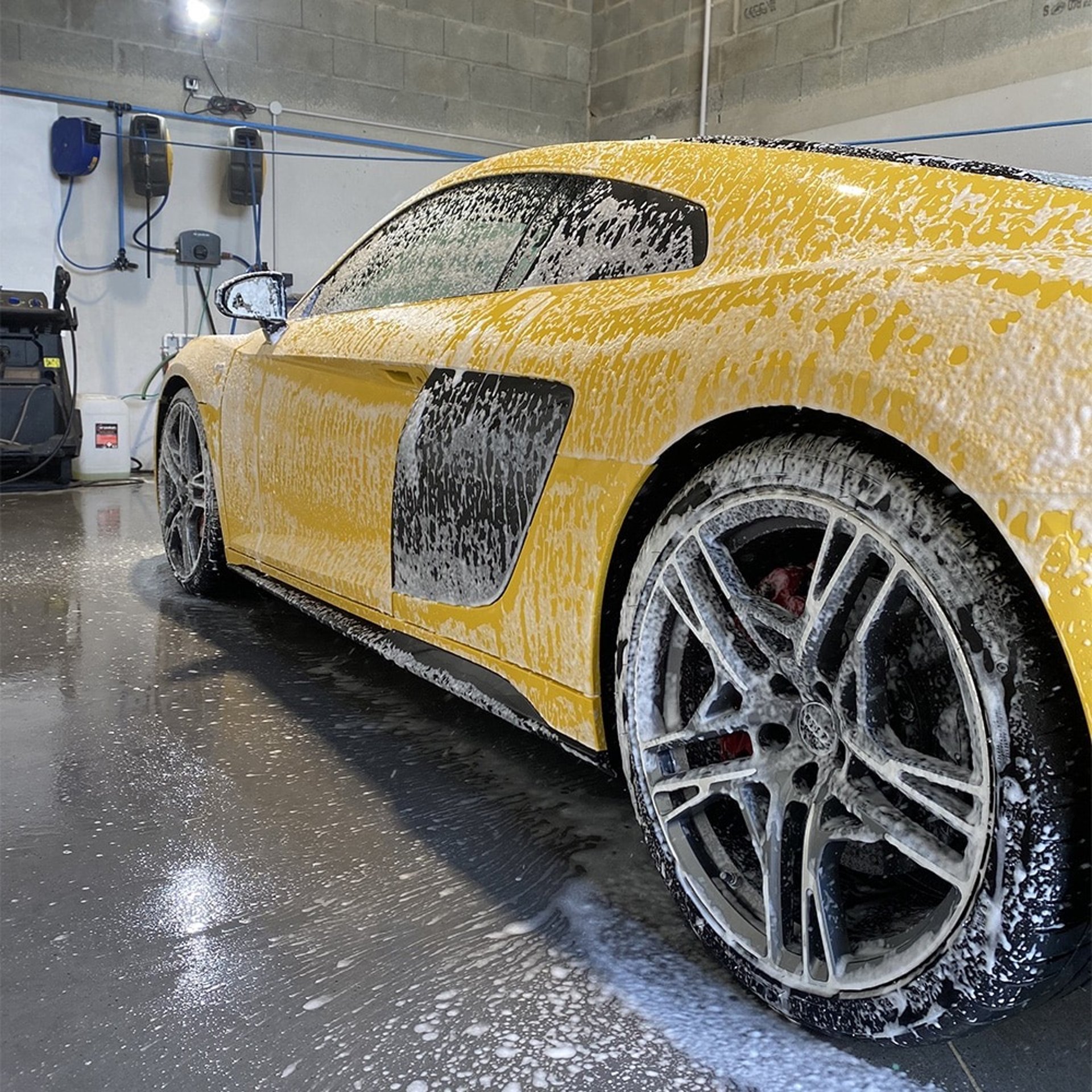 woman wearing yellow long-sleeved dress under white clouds and blue sky during daytime