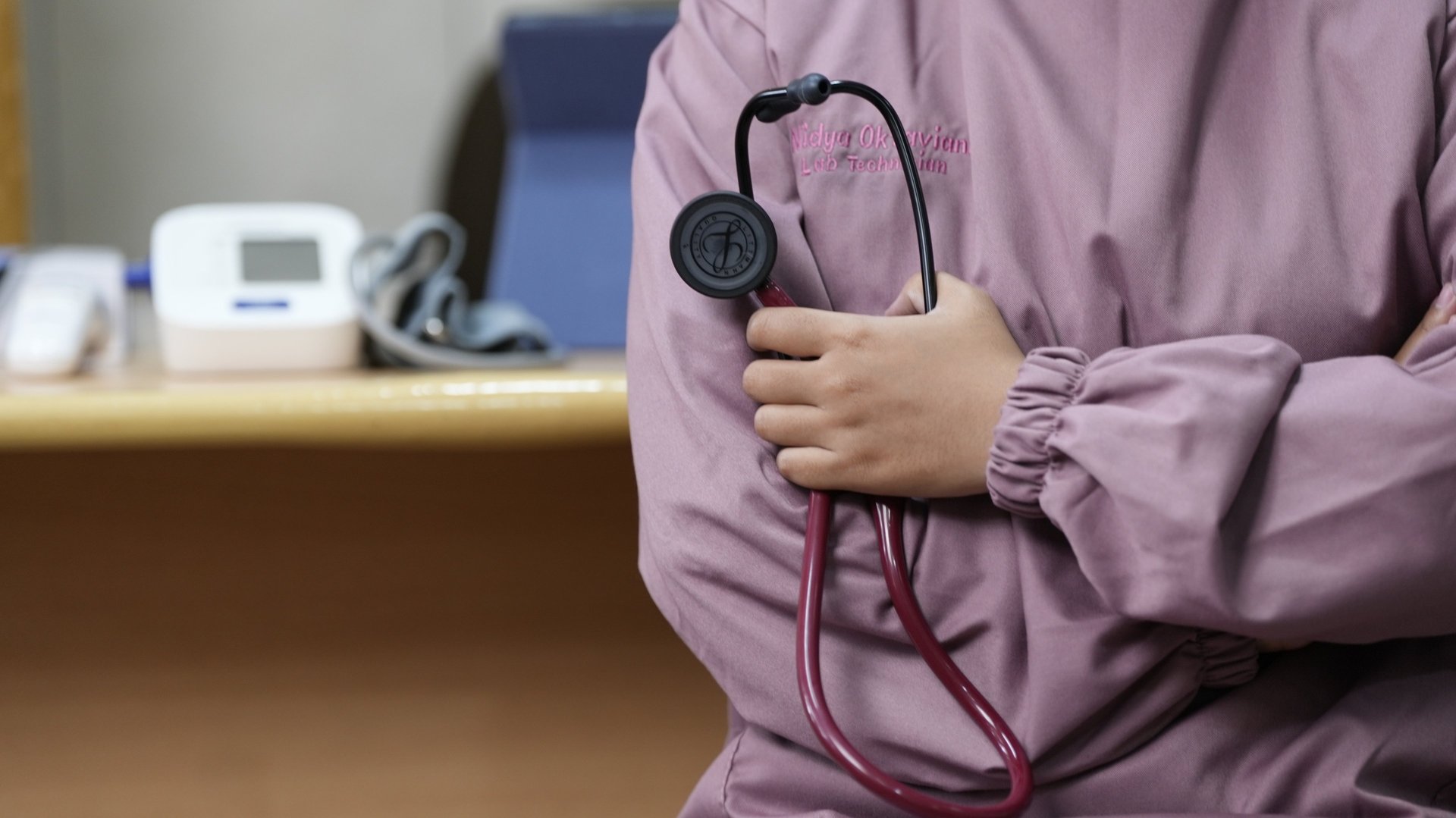 an open book with a stethoscope on top of it