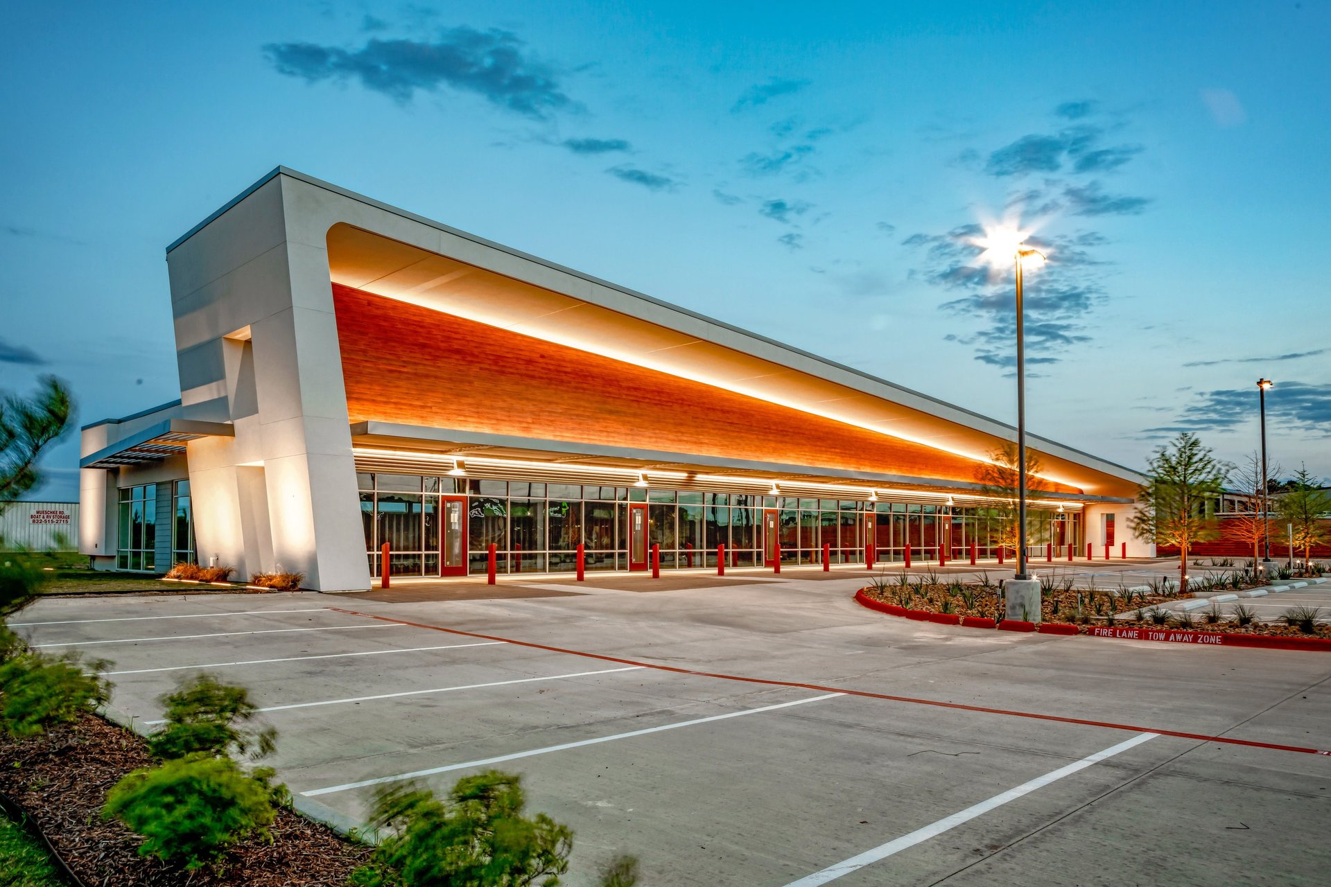 a large building with a parking lot