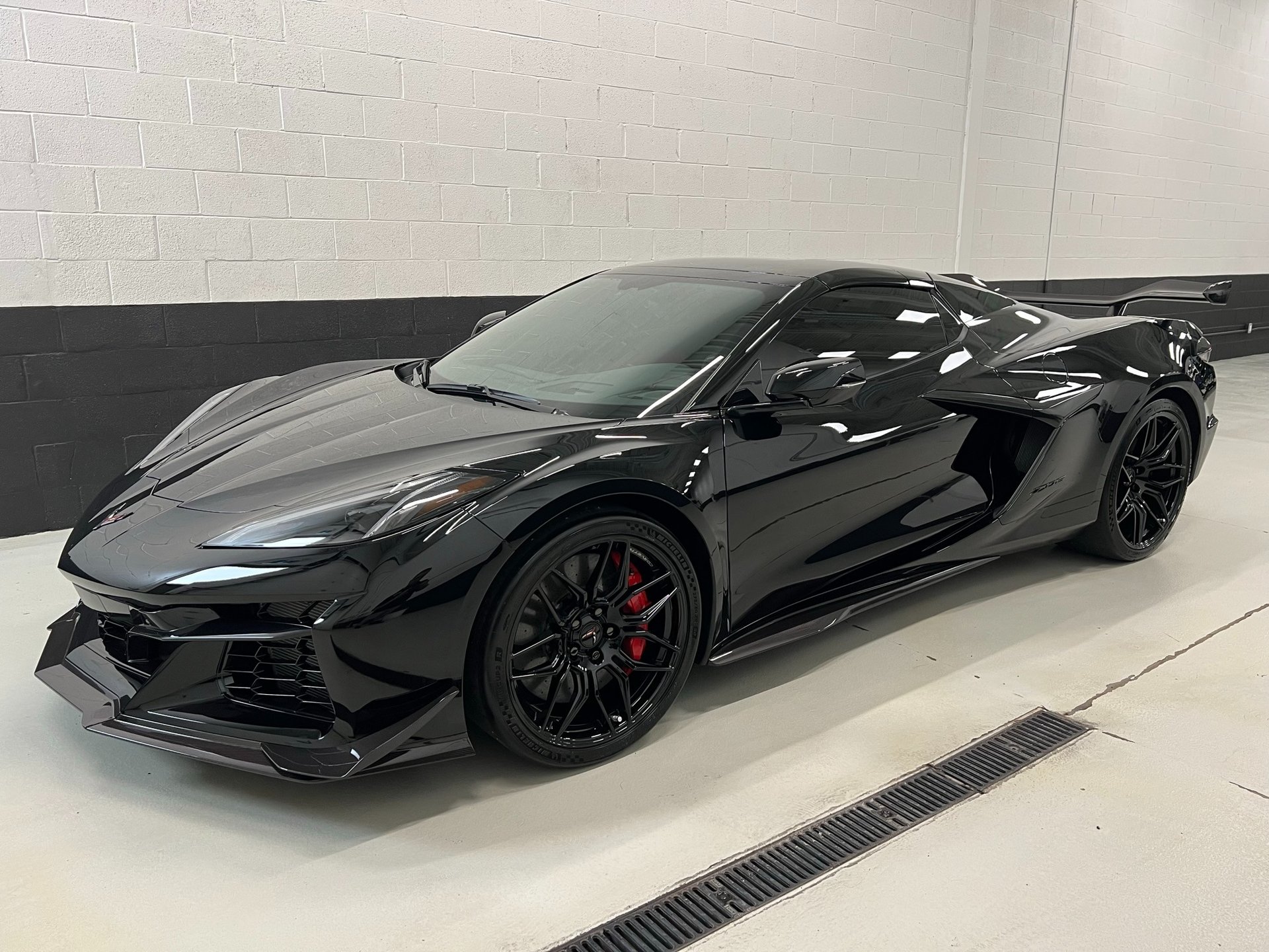 black and brown leather padded tub sofa