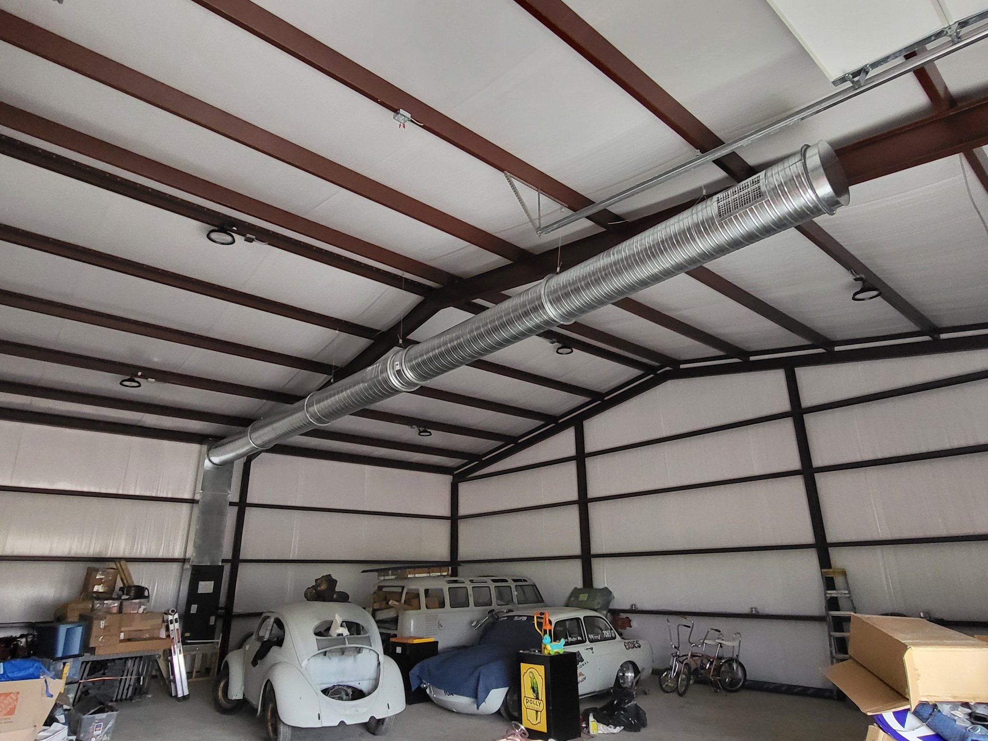 woman wearing yellow long-sleeved dress under white clouds and blue sky during daytime