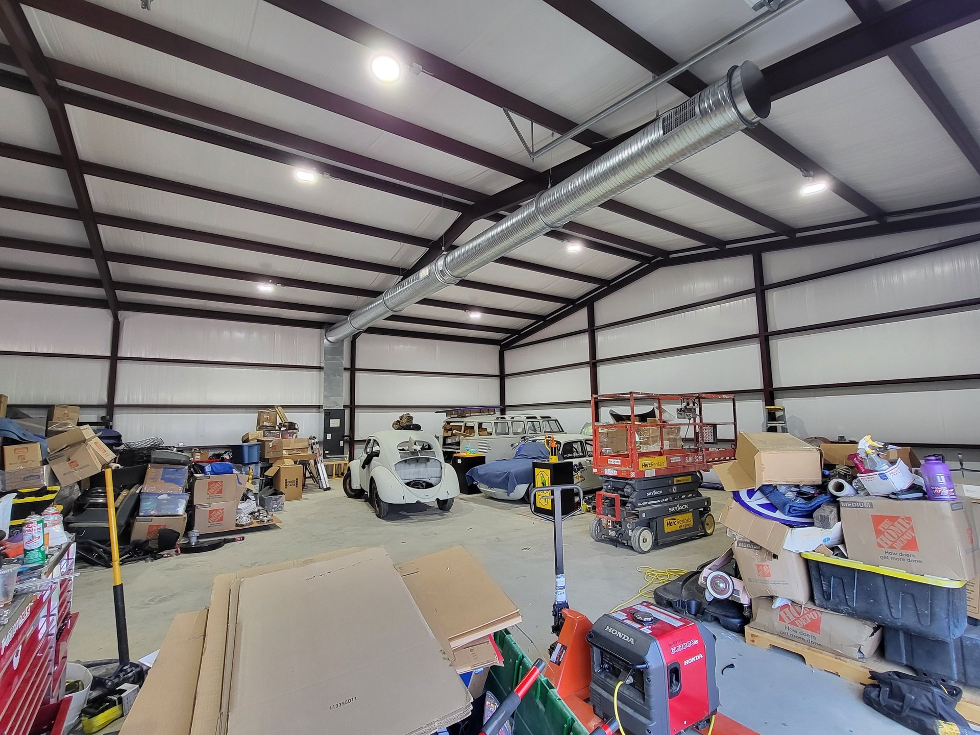 black and brown leather padded tub sofa