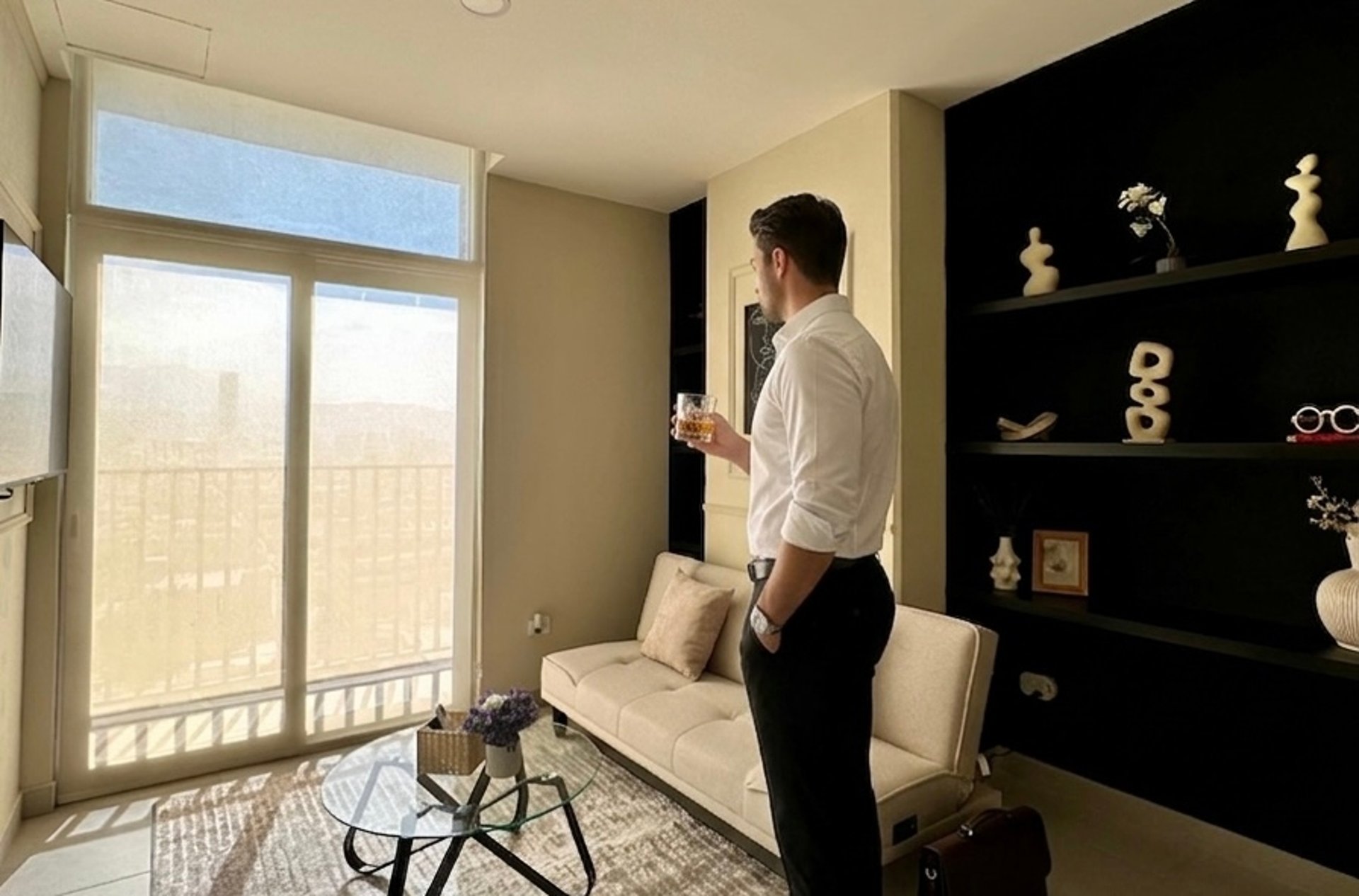 empty hallway between concrete buildings during daytime