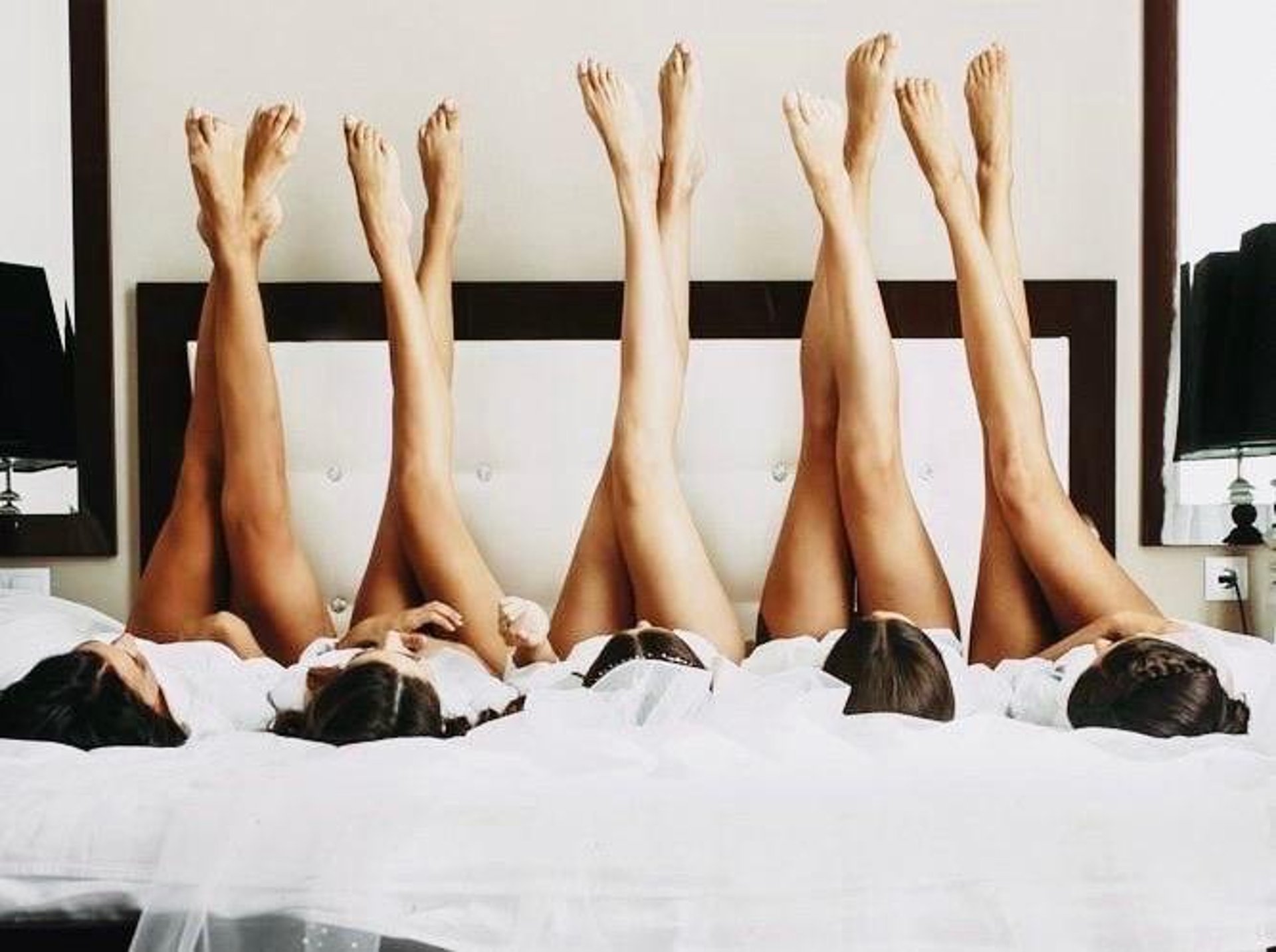 woman wearing yellow long-sleeved dress under white clouds and blue sky during daytime