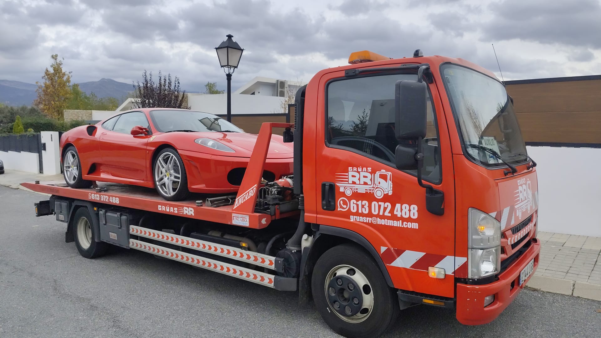 black and brown leather padded tub sofa
