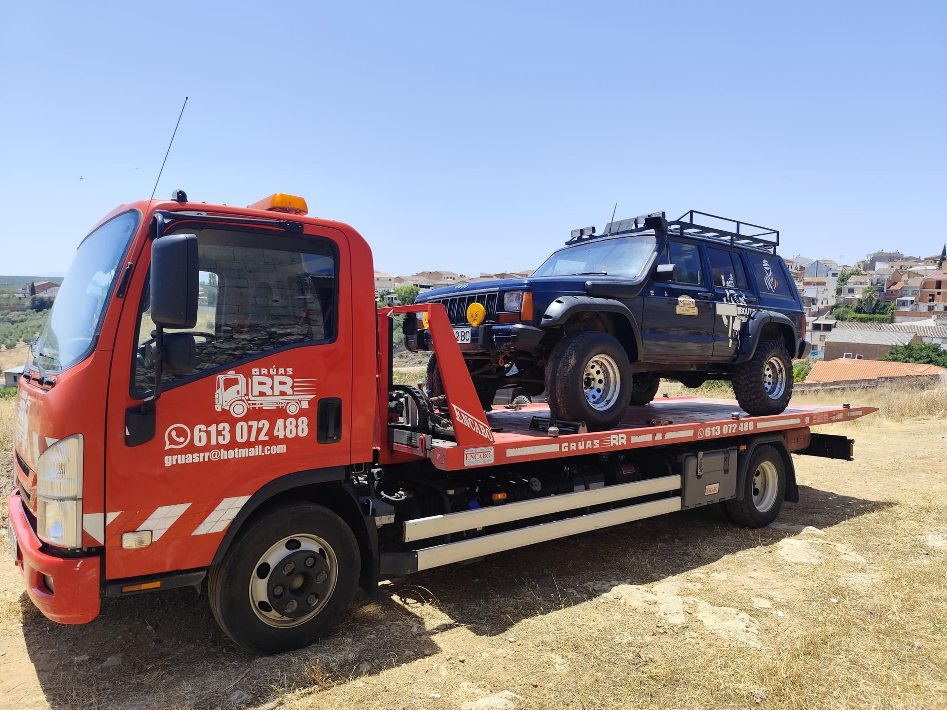 black and brown leather padded tub sofa