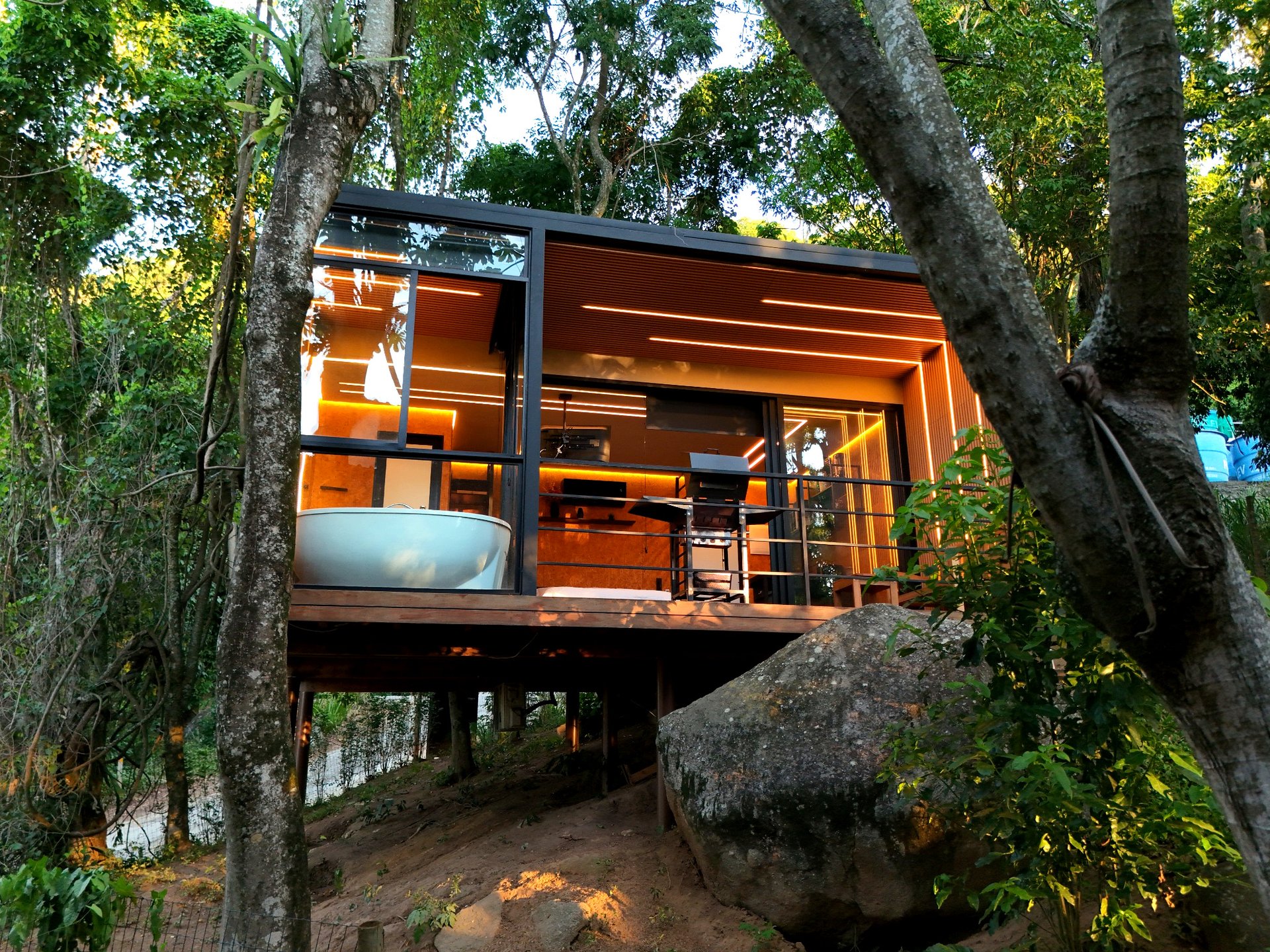 black and brown leather padded tub sofa