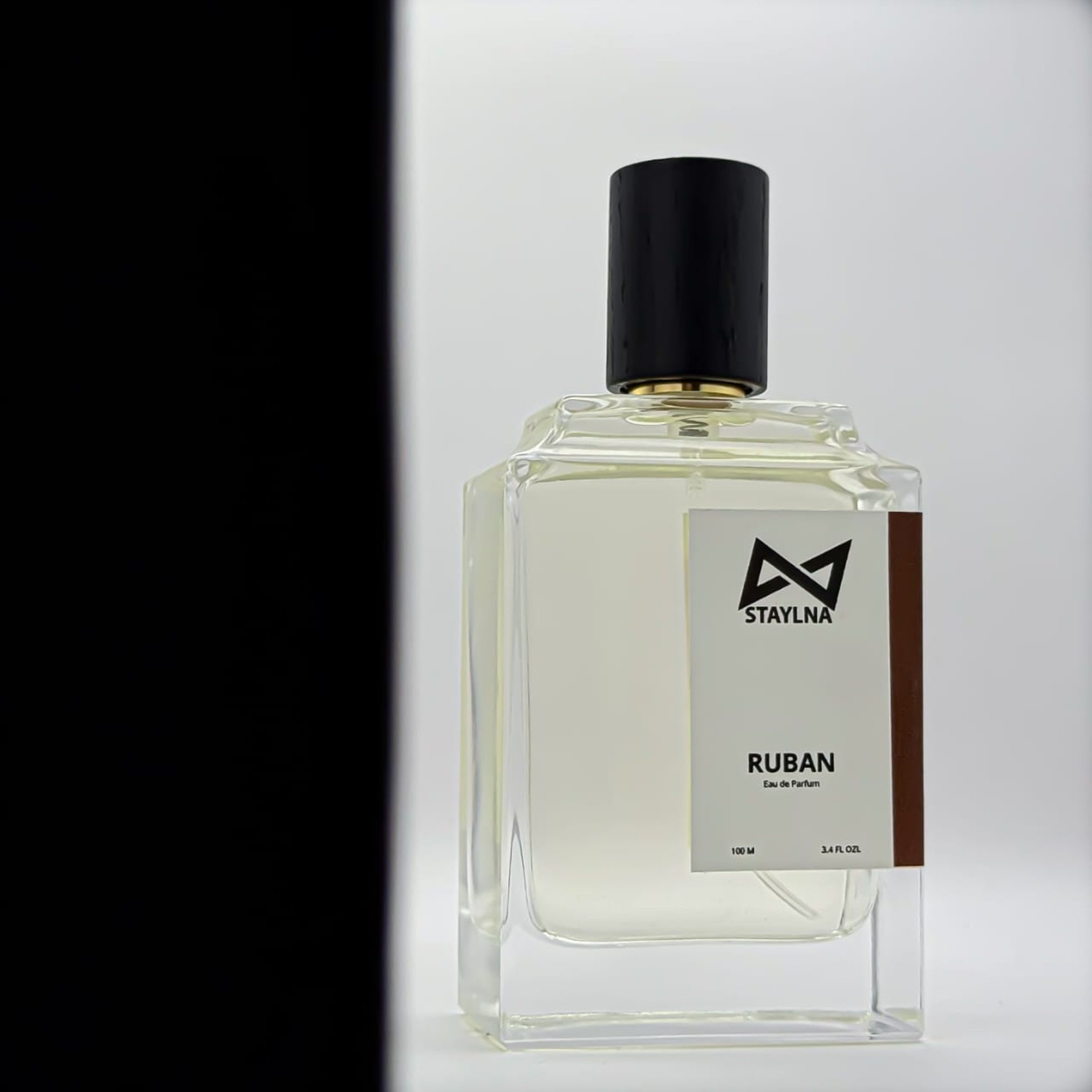 an abstract photo of a curved building with a blue sky in the background