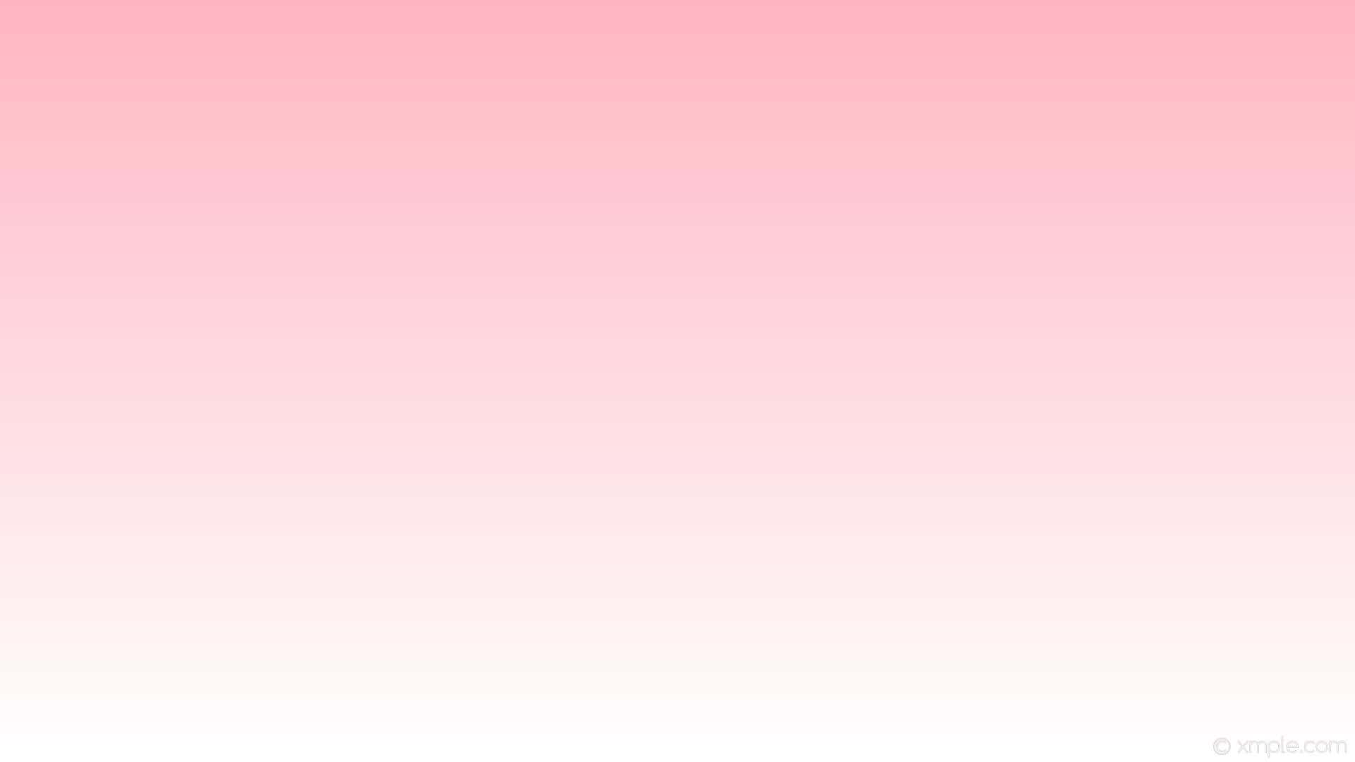 a blurry image of a pink and white background