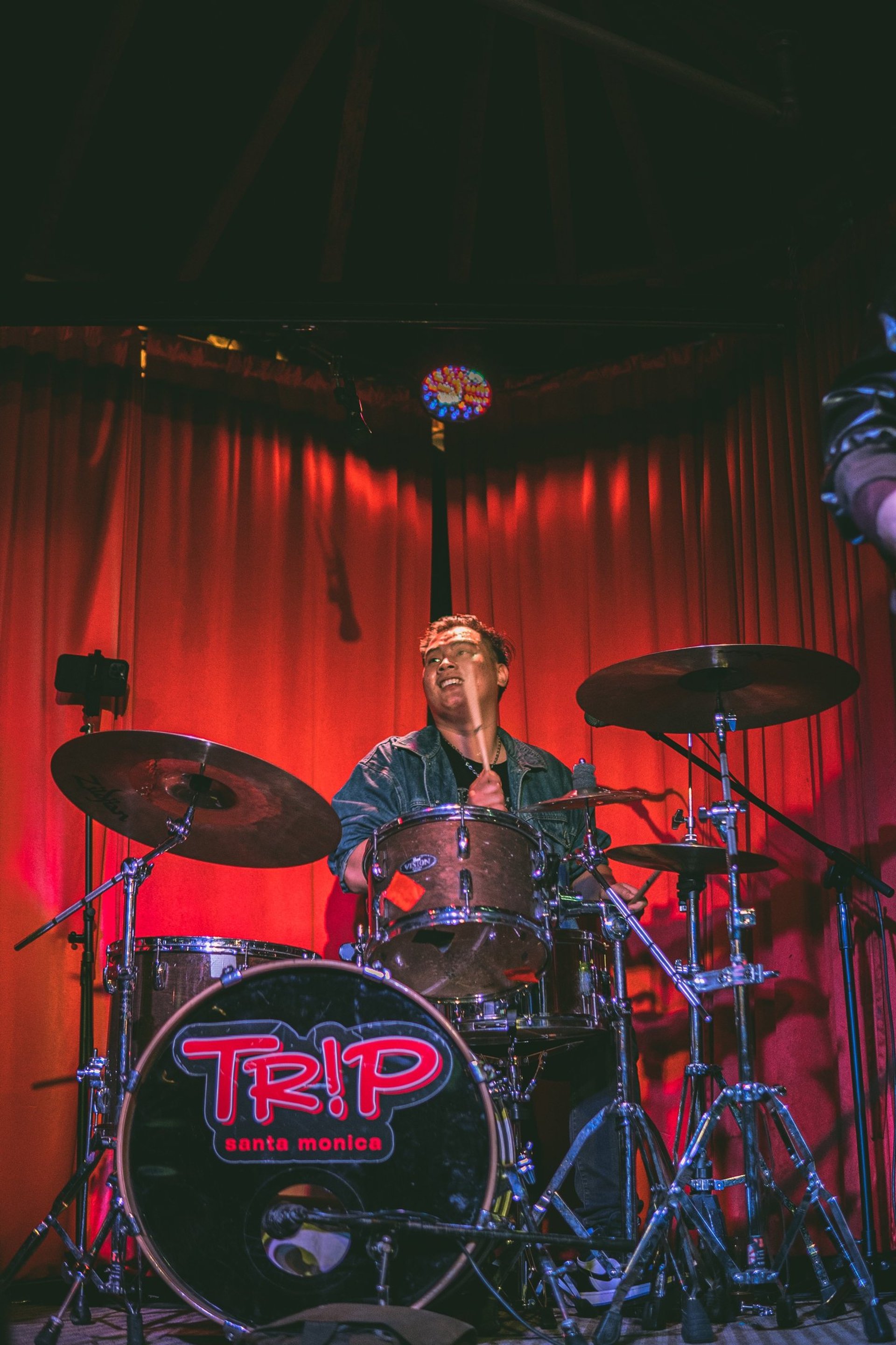 an abstract photo of a curved building with a blue sky in the background